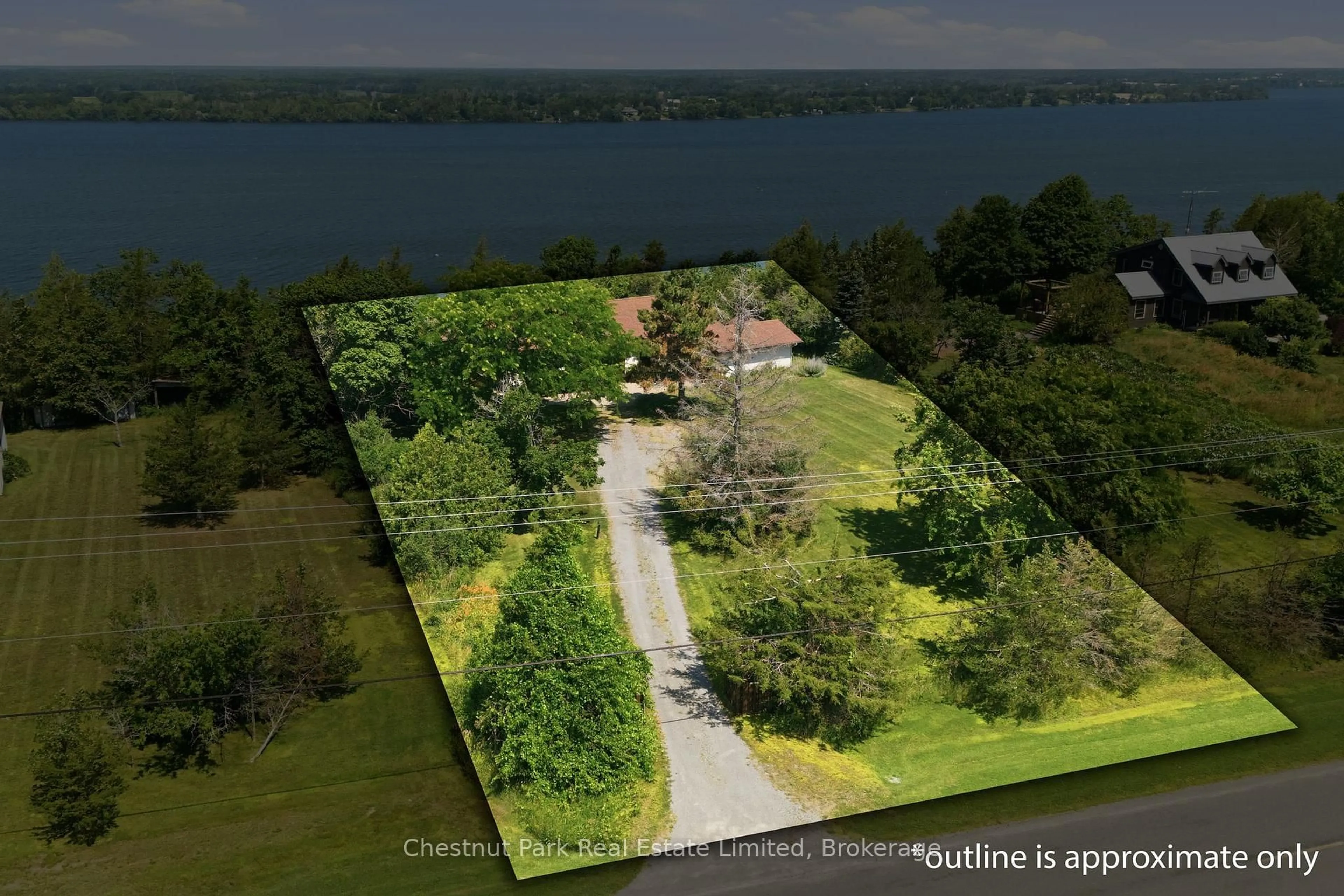 A pic from outside/outdoor area/front of a property/back of a property/a pic from drone, water/lake/river/ocean view for 1979 County Road 7, Prince Edward County Ontario K0K 2T0