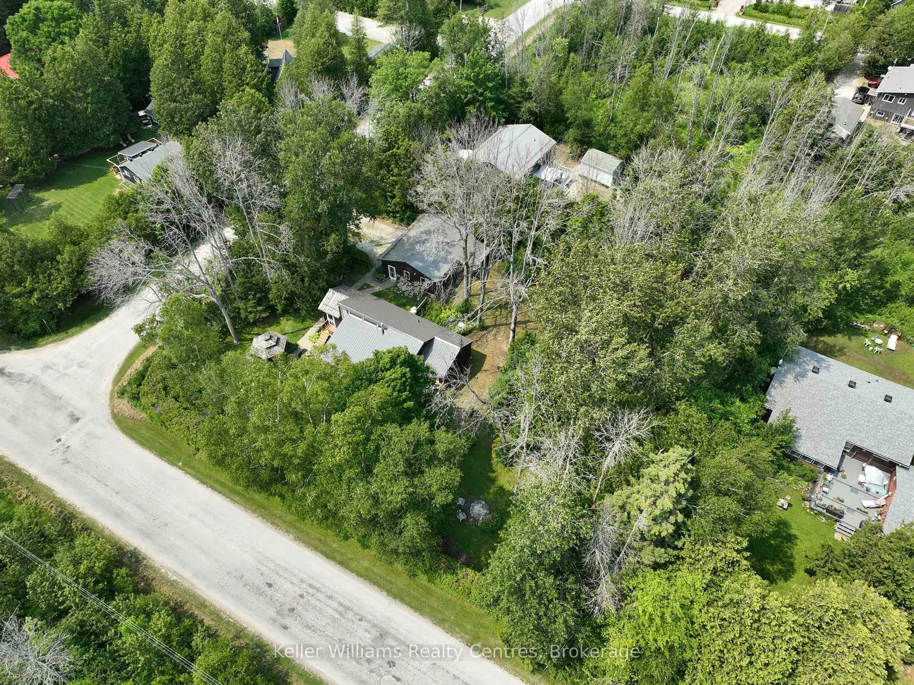 A pic from outside/outdoor area/front of a property/back of a property/a pic from drone, forest/trees view for 3 Cardinal Ave, South Bruce Peninsula Ontario N0H 2T0