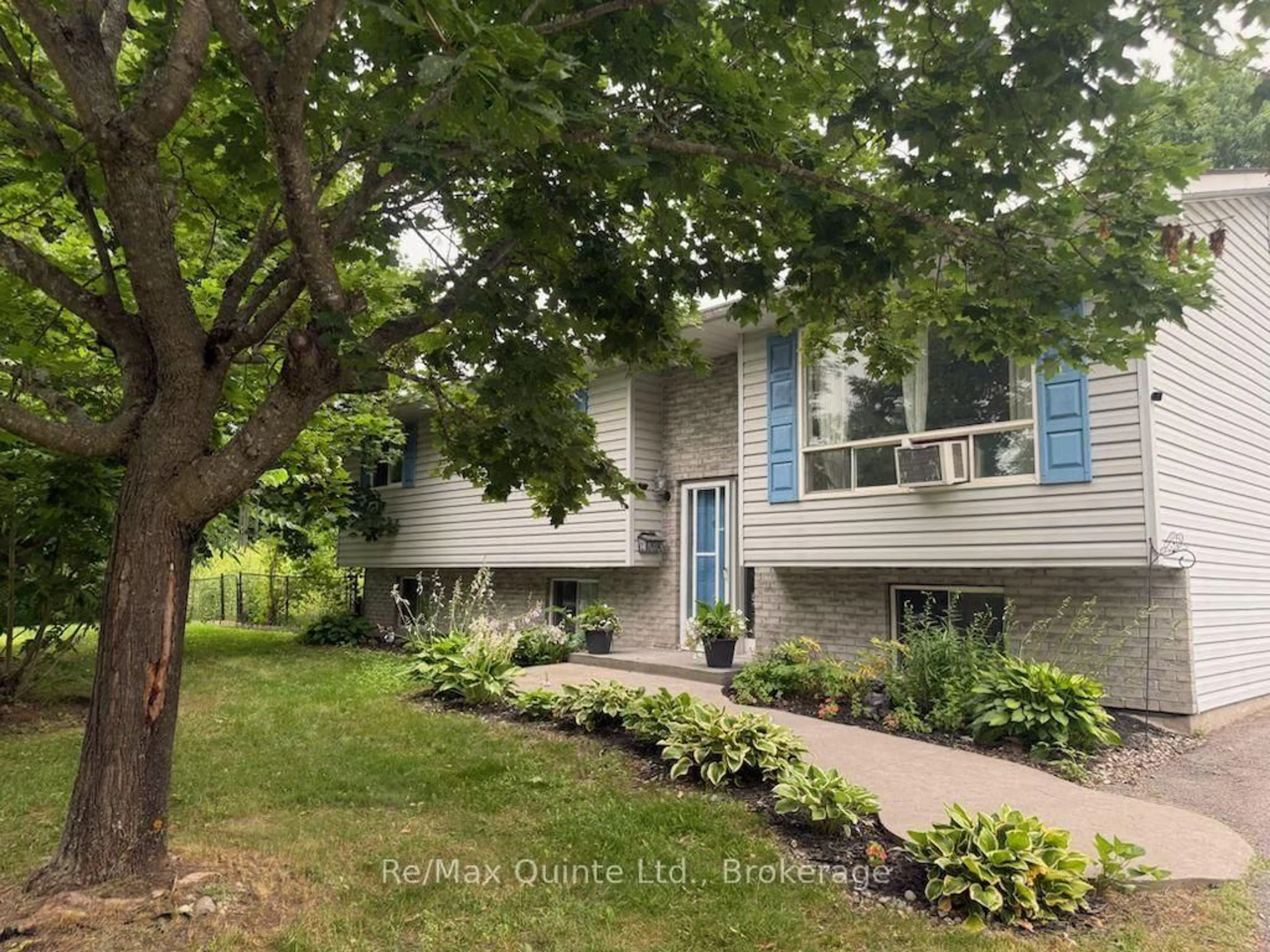 Home with vinyl exterior material, street for 94 Grenville Park Dr, Hastings Ontario K0K 2C0