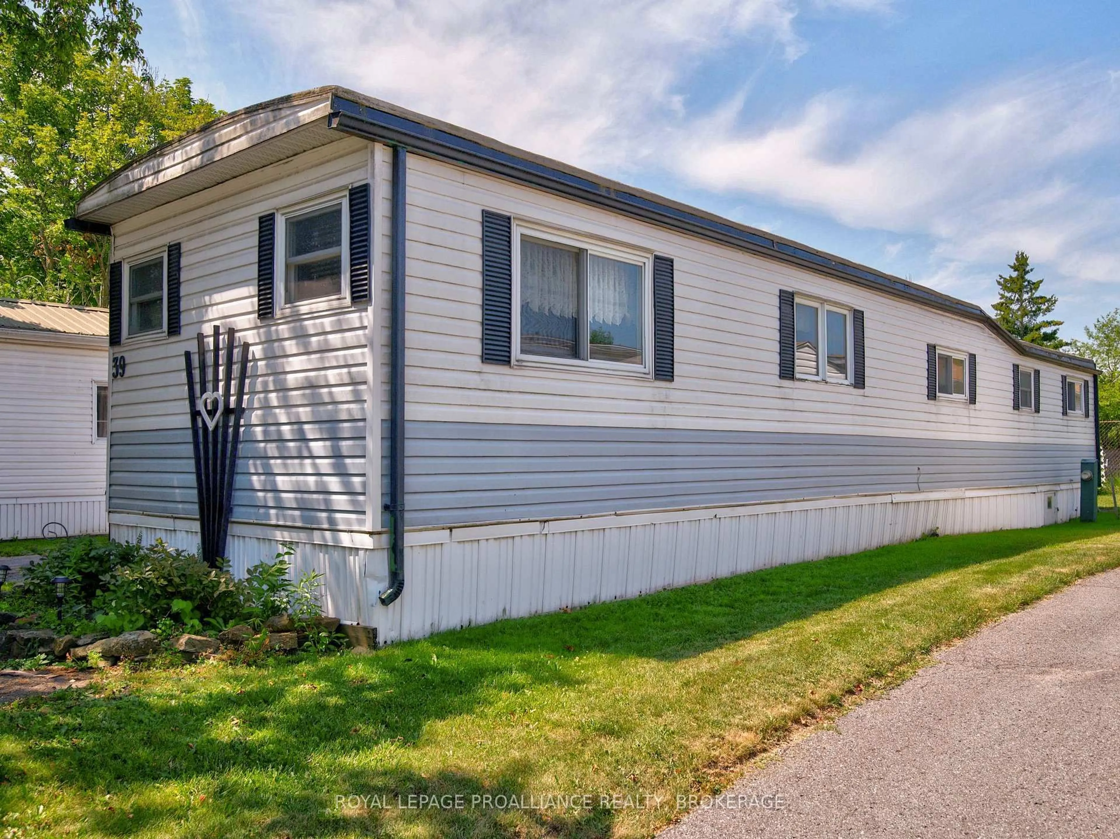 Home with vinyl exterior material, street for 39 Worthington Way, Kingston Ontario K7K 5C2