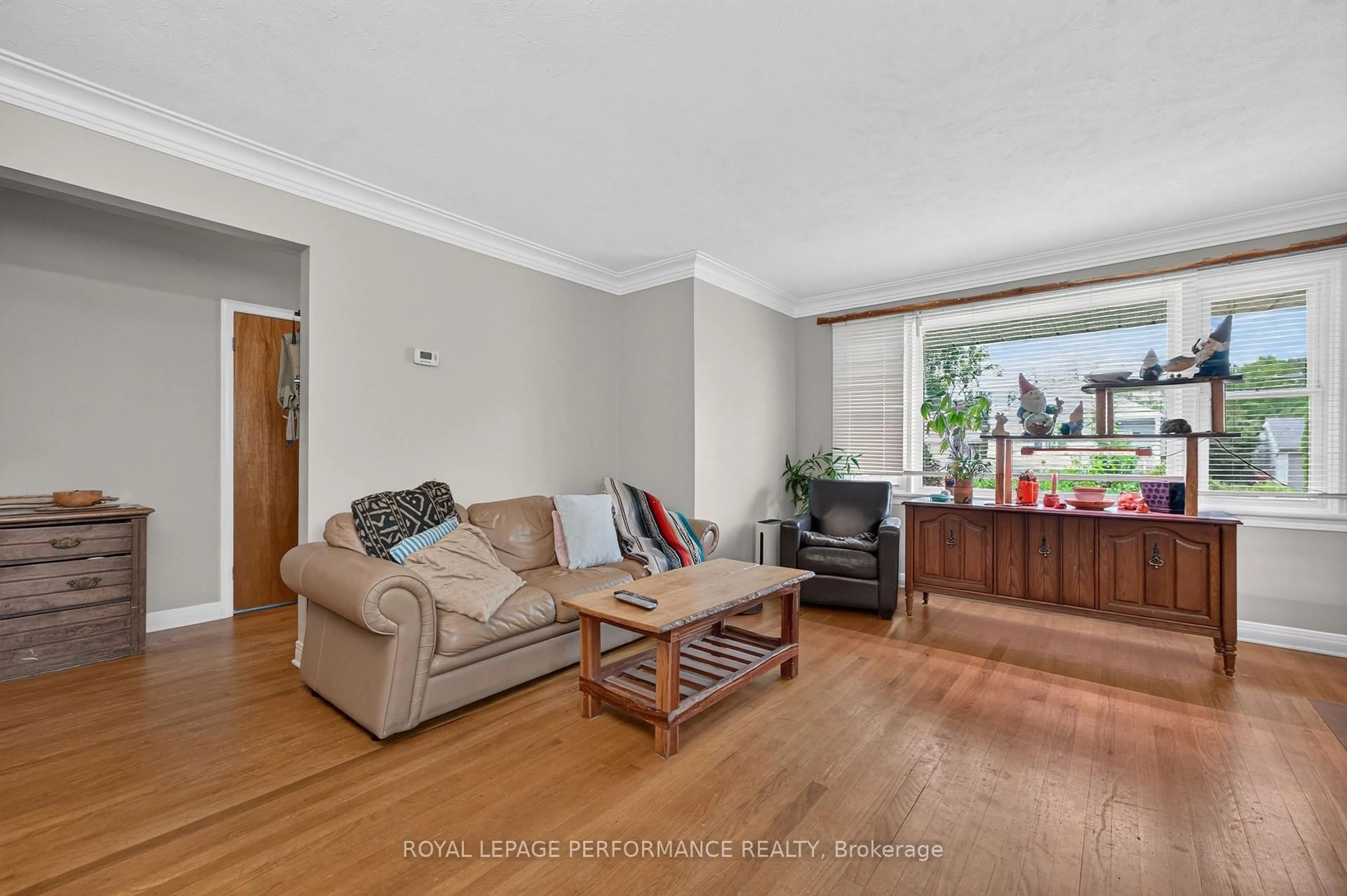 Living room with furniture, unknown for 245 Compton Ave, Ottawa Ontario K2B 5A9