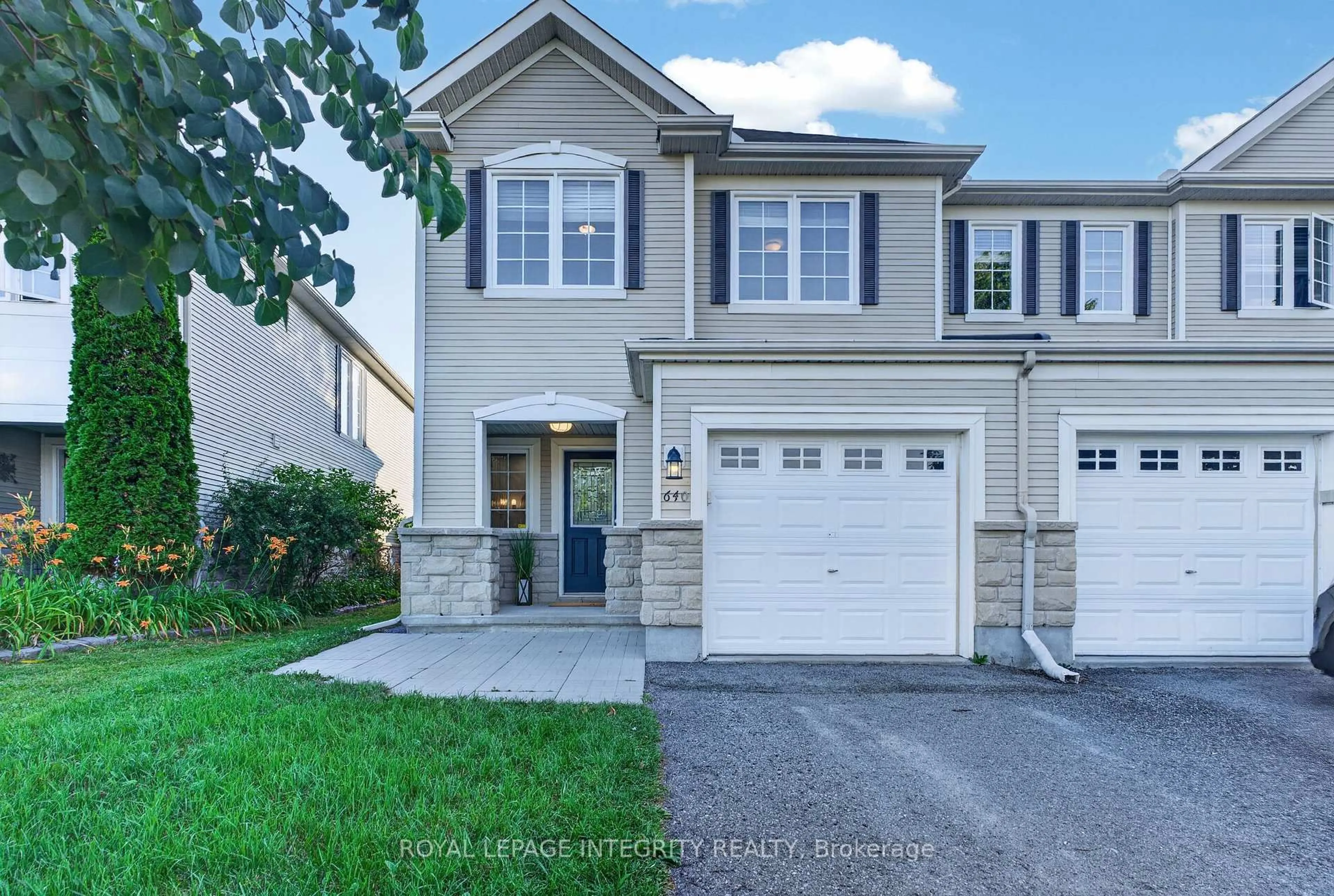 Home with vinyl exterior material, street for 640 Kilbirnie Dr, Ottawa Ontario K2J 0G7