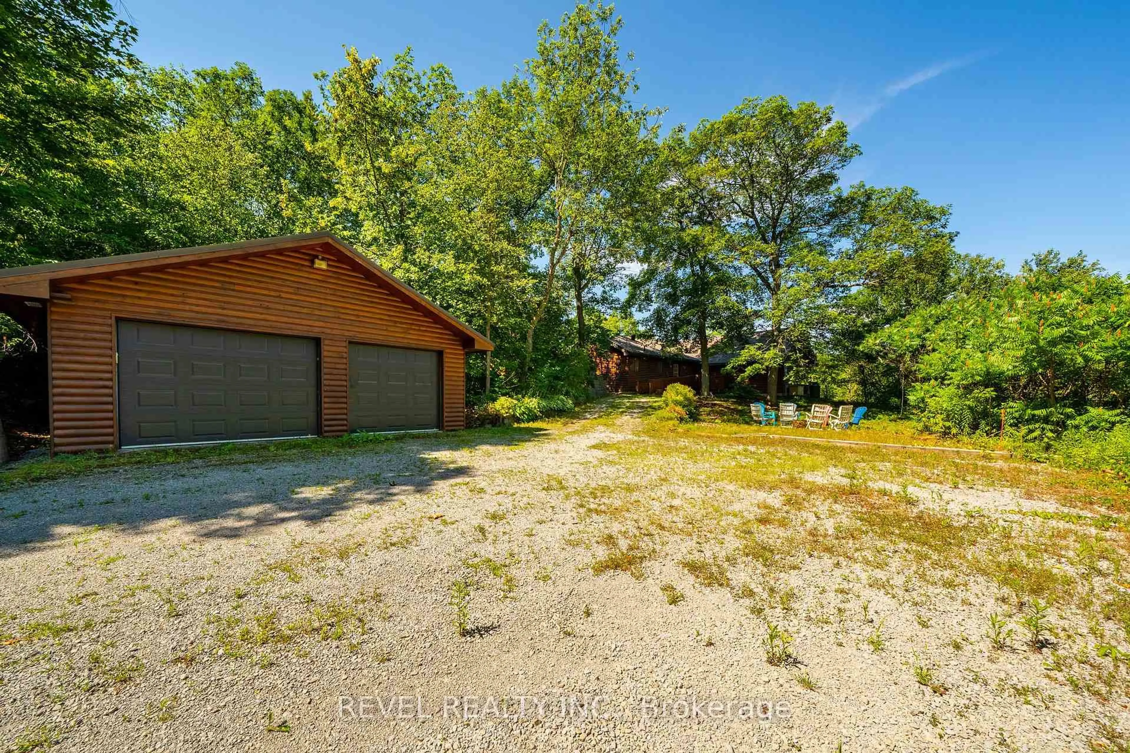 A pic from outside/outdoor area/front of a property/back of a property/a pic from drone, unknown for 180 Lake Rd, Georgian Bay Ontario L0K 1S0