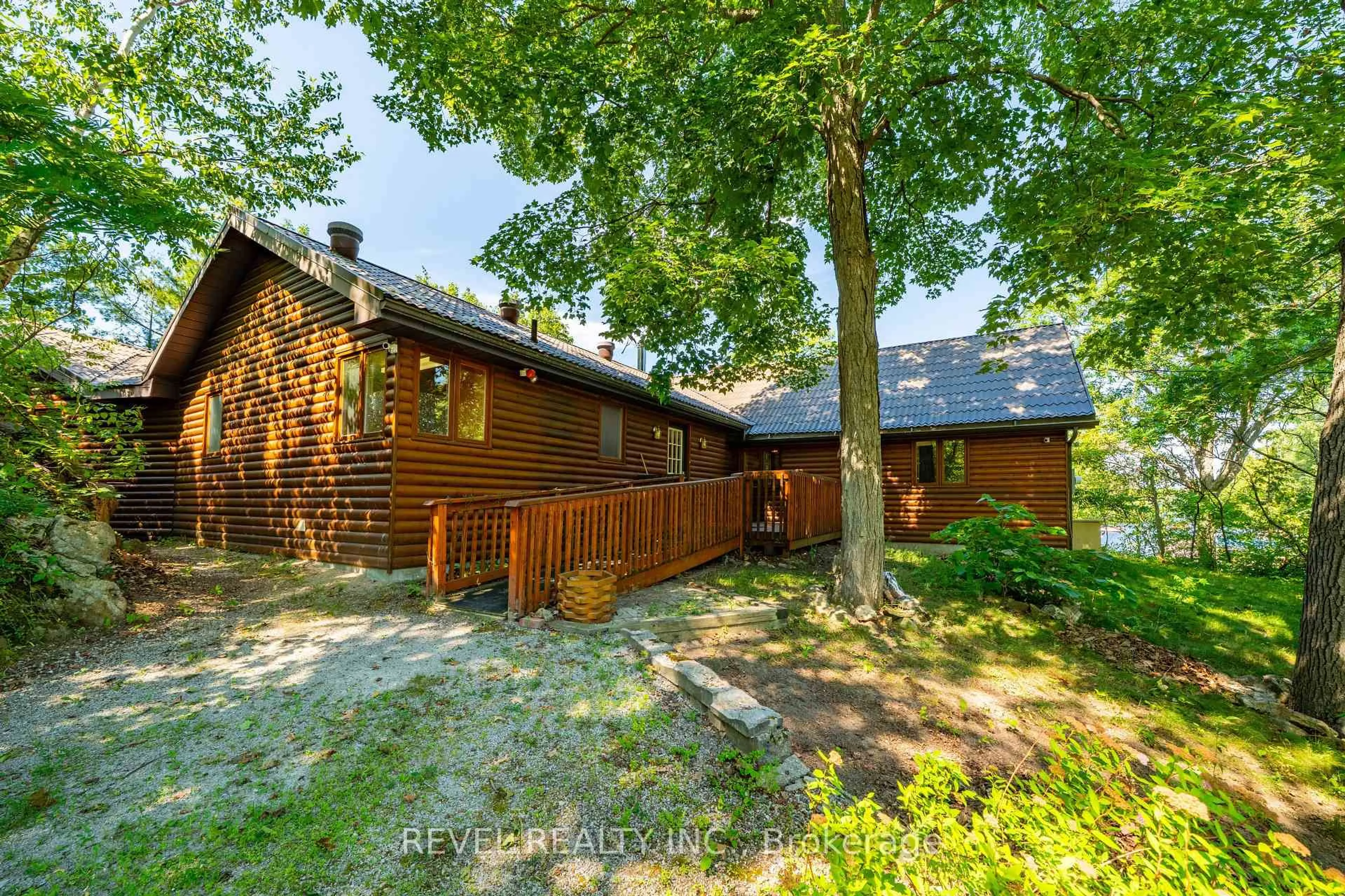 A pic from outside/outdoor area/front of a property/back of a property/a pic from drone, forest/trees view for 180 Lake Rd, Georgian Bay Ontario L0K 1S0