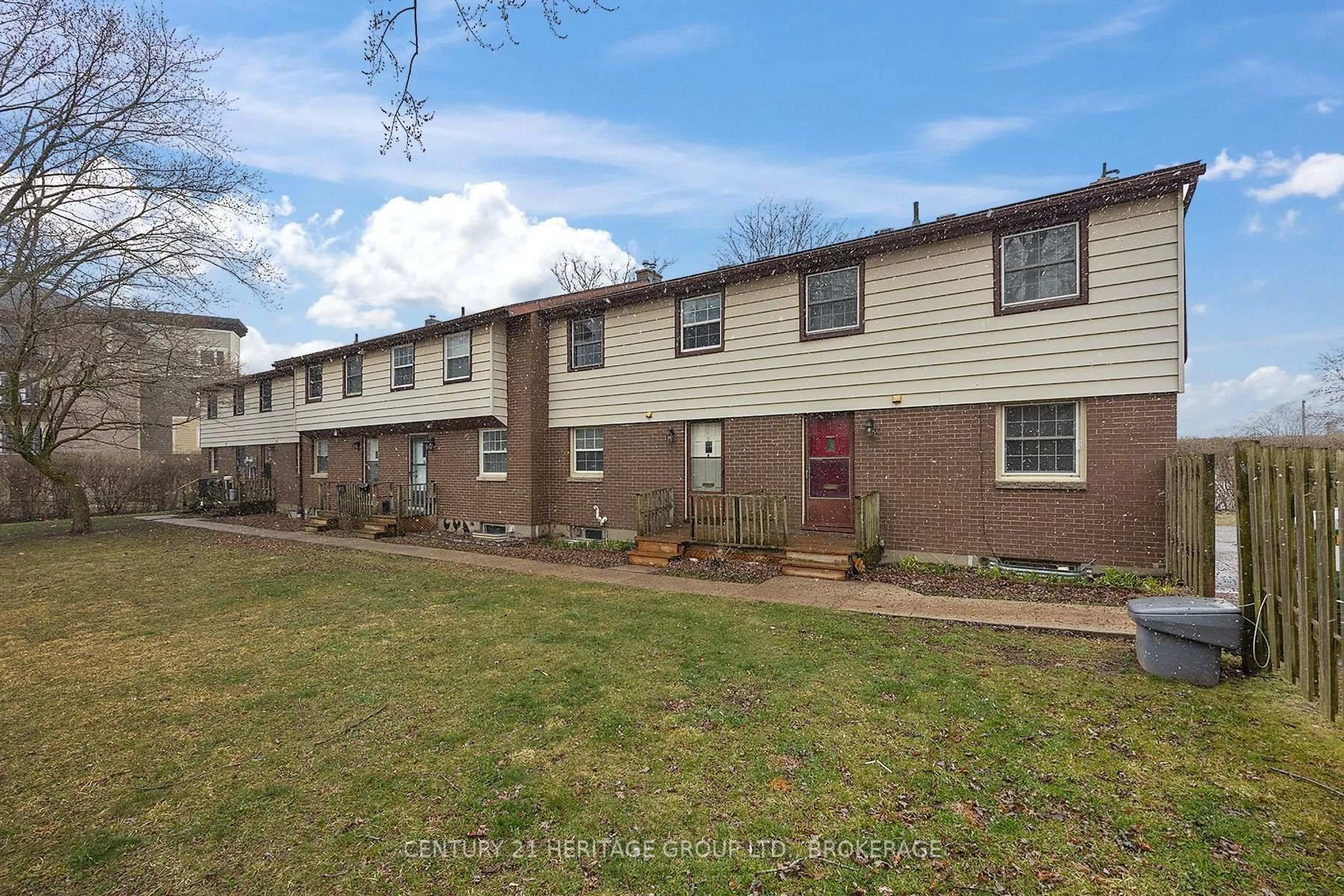 A pic from outside/outdoor area/front of a property/back of a property/a pic from drone, street for 136 Notch Hill Rd #5, Kingston Ontario K7M 2X1