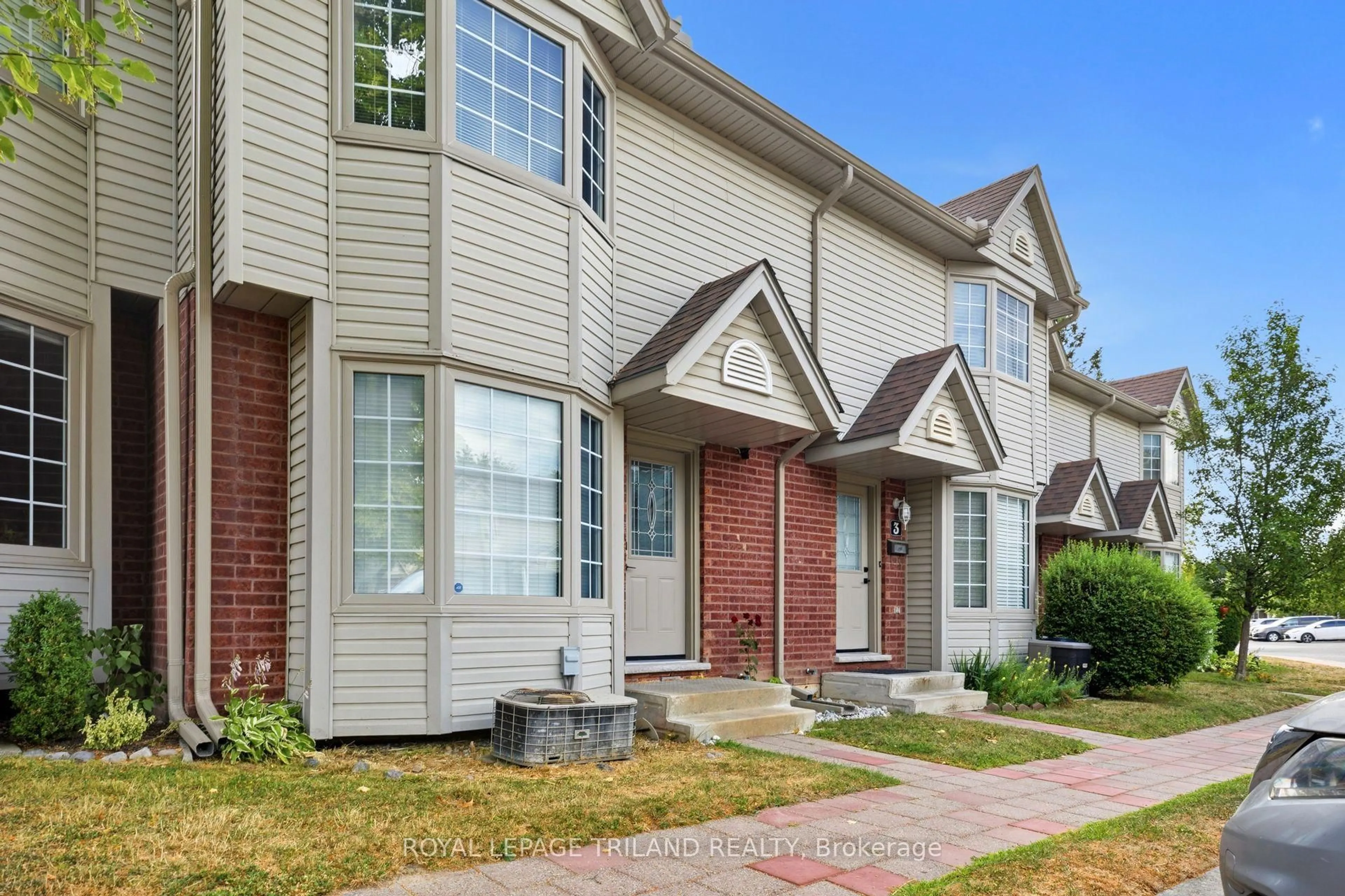 Home with brick exterior material, street for 50 Chapman Crt #4, London North Ontario N6G 5E1