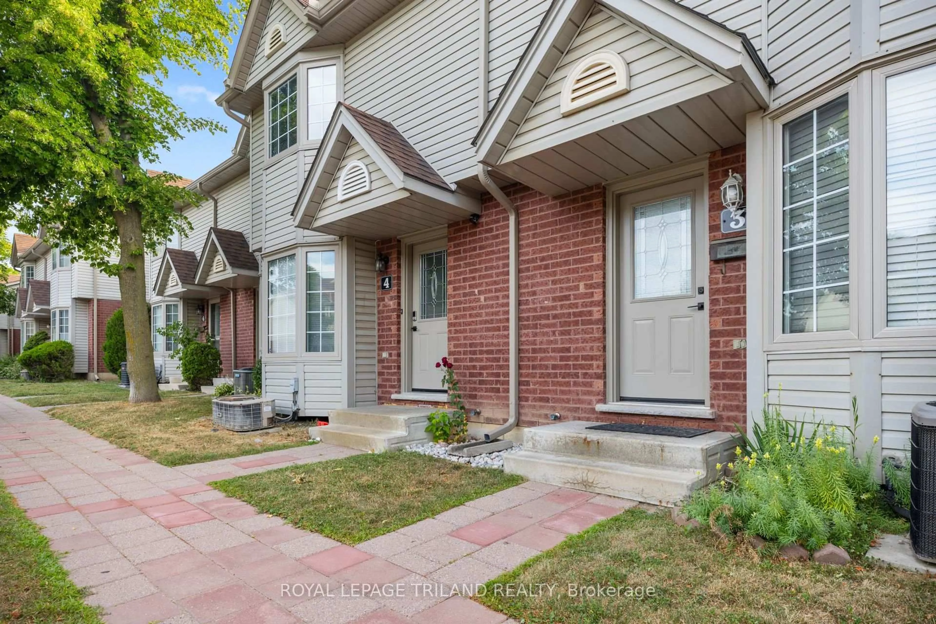 Home with brick exterior material, street for 50 Chapman Crt #4, London North Ontario N6G 5E1