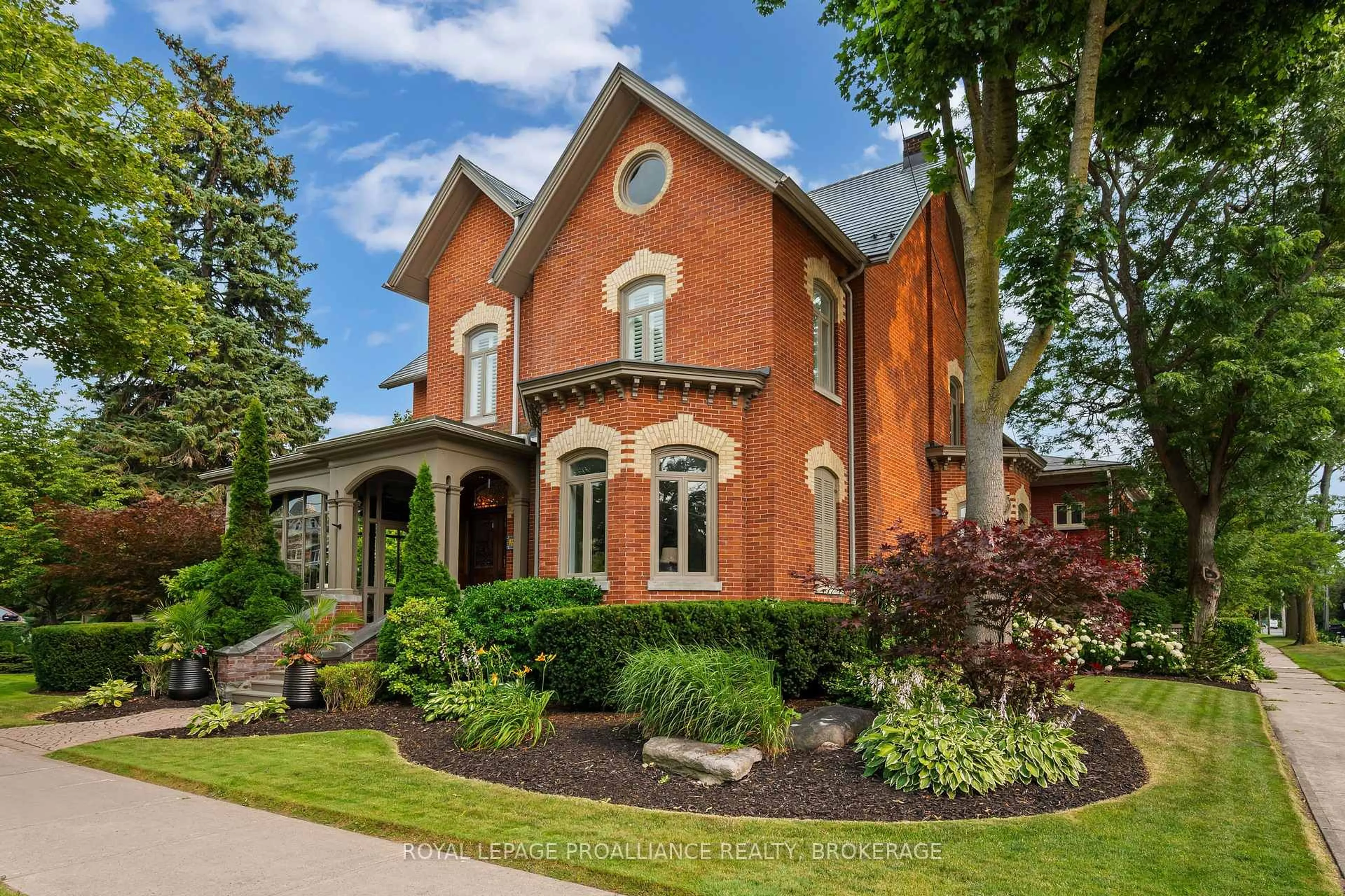 Home with brick exterior material, street for 115 Bridge St, Belleville Ontario K8N 1M4
