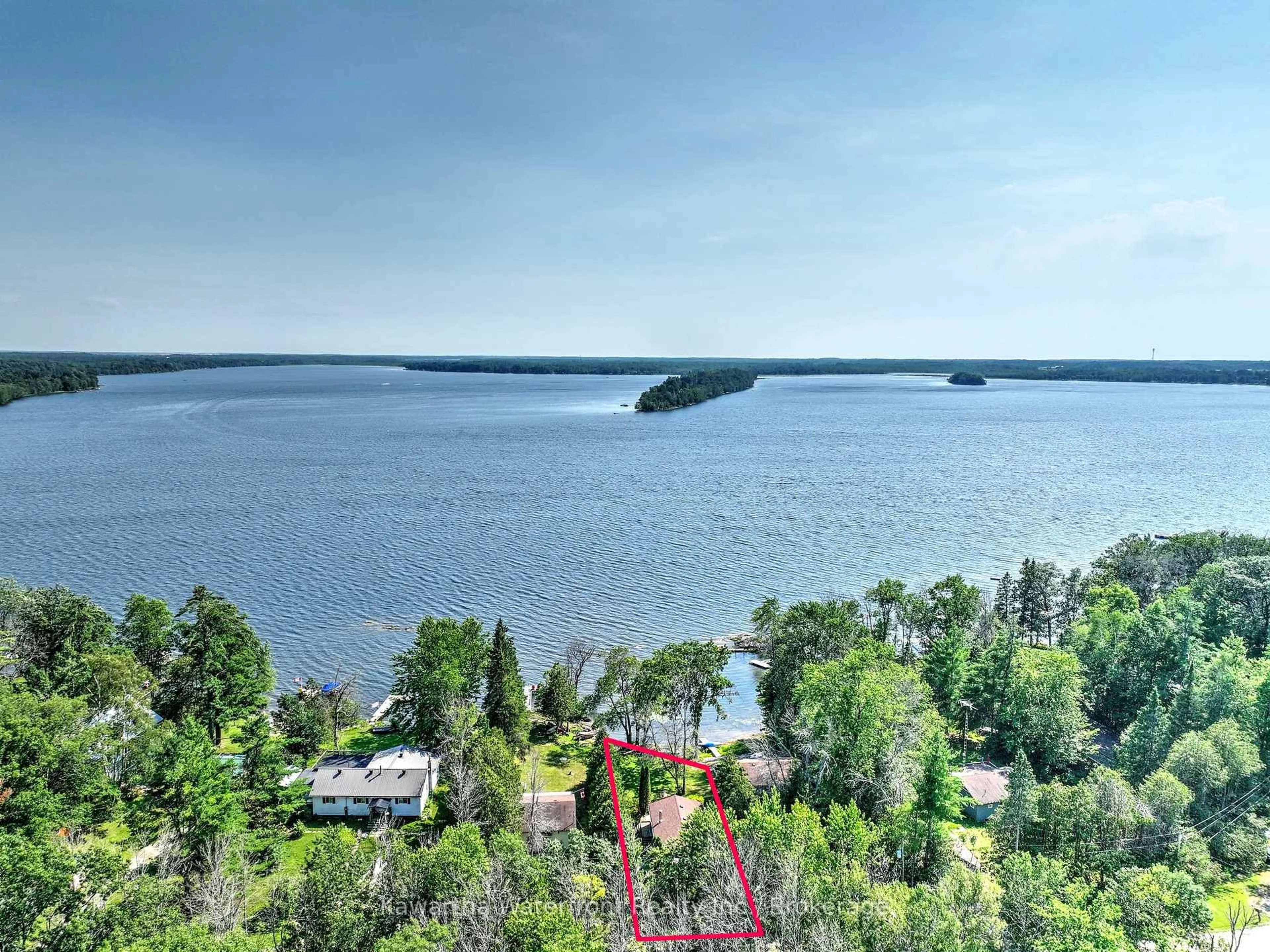 A pic from outside/outdoor area/front of a property/back of a property/a pic from drone, water/lake/river/ocean view for 129 McCrackin Ave, Kawartha Lakes Ontario L0K 1W0