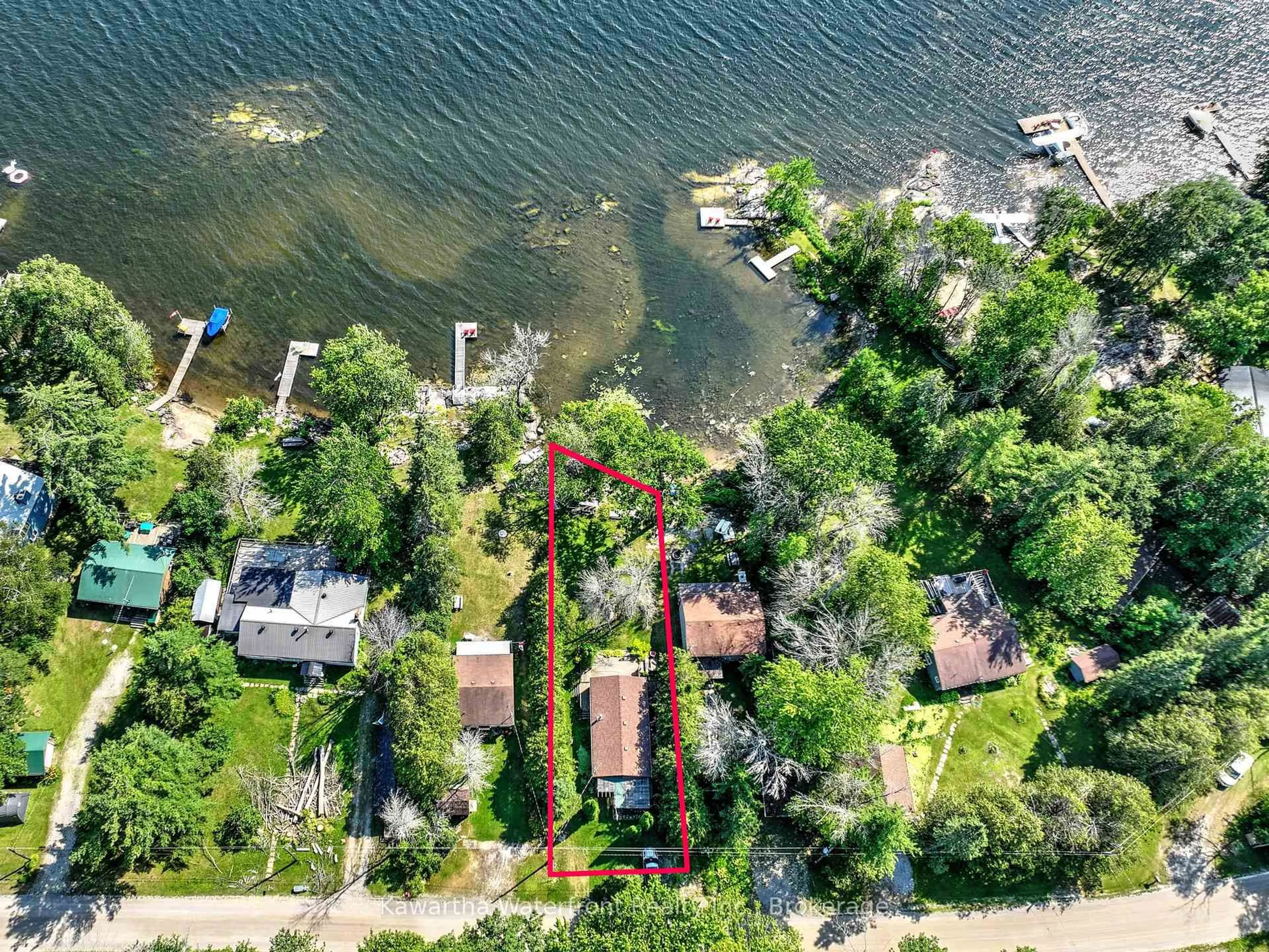 A pic from outside/outdoor area/front of a property/back of a property/a pic from drone, water/lake/river/ocean view for 129 McCrackin Ave, Kawartha Lakes Ontario L0K 1W0