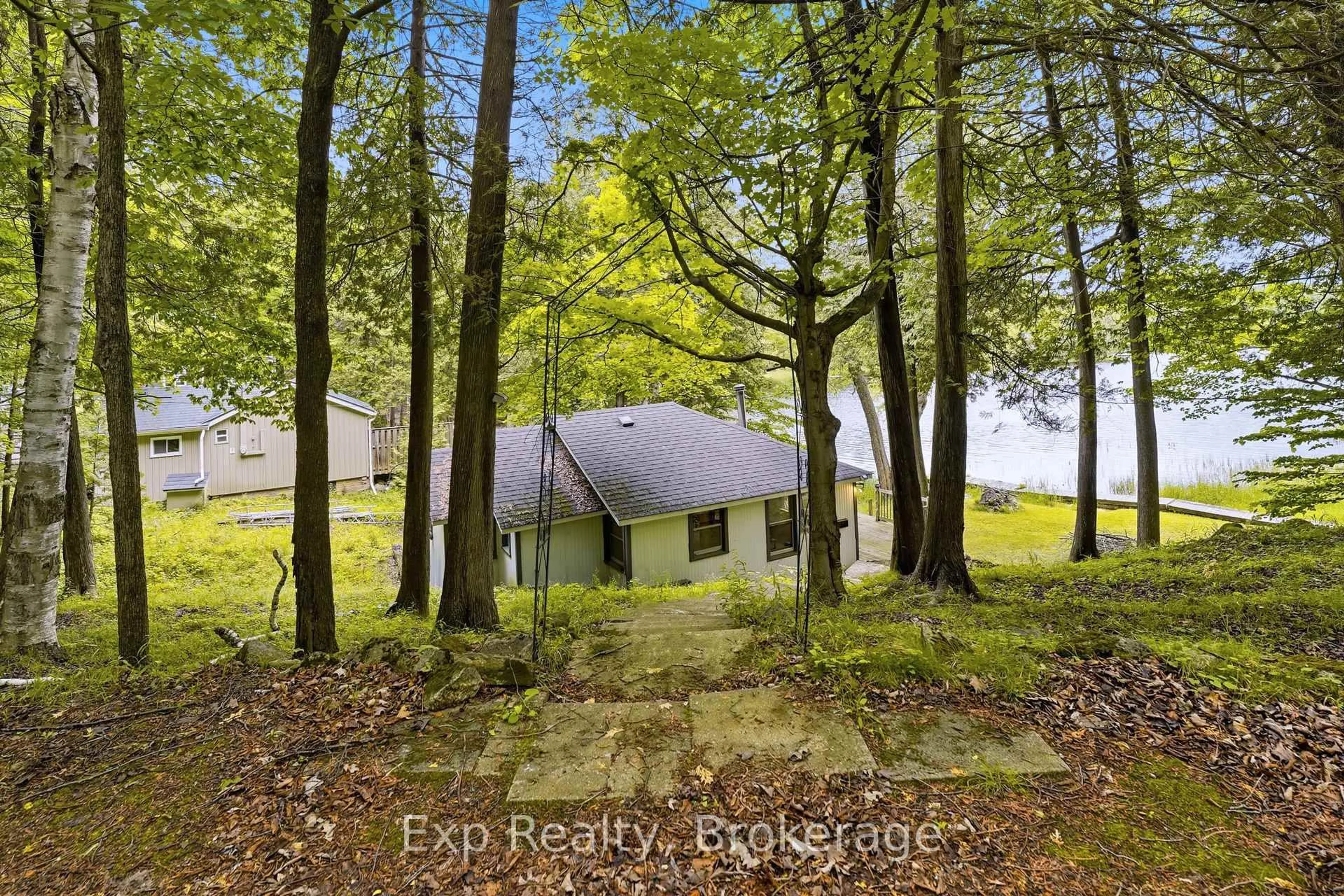 A pic from outside/outdoor area/front of a property/back of a property/a pic from drone, forest/trees view for 2077 Hambly Lane, Hartington Ontario K0H 1W0