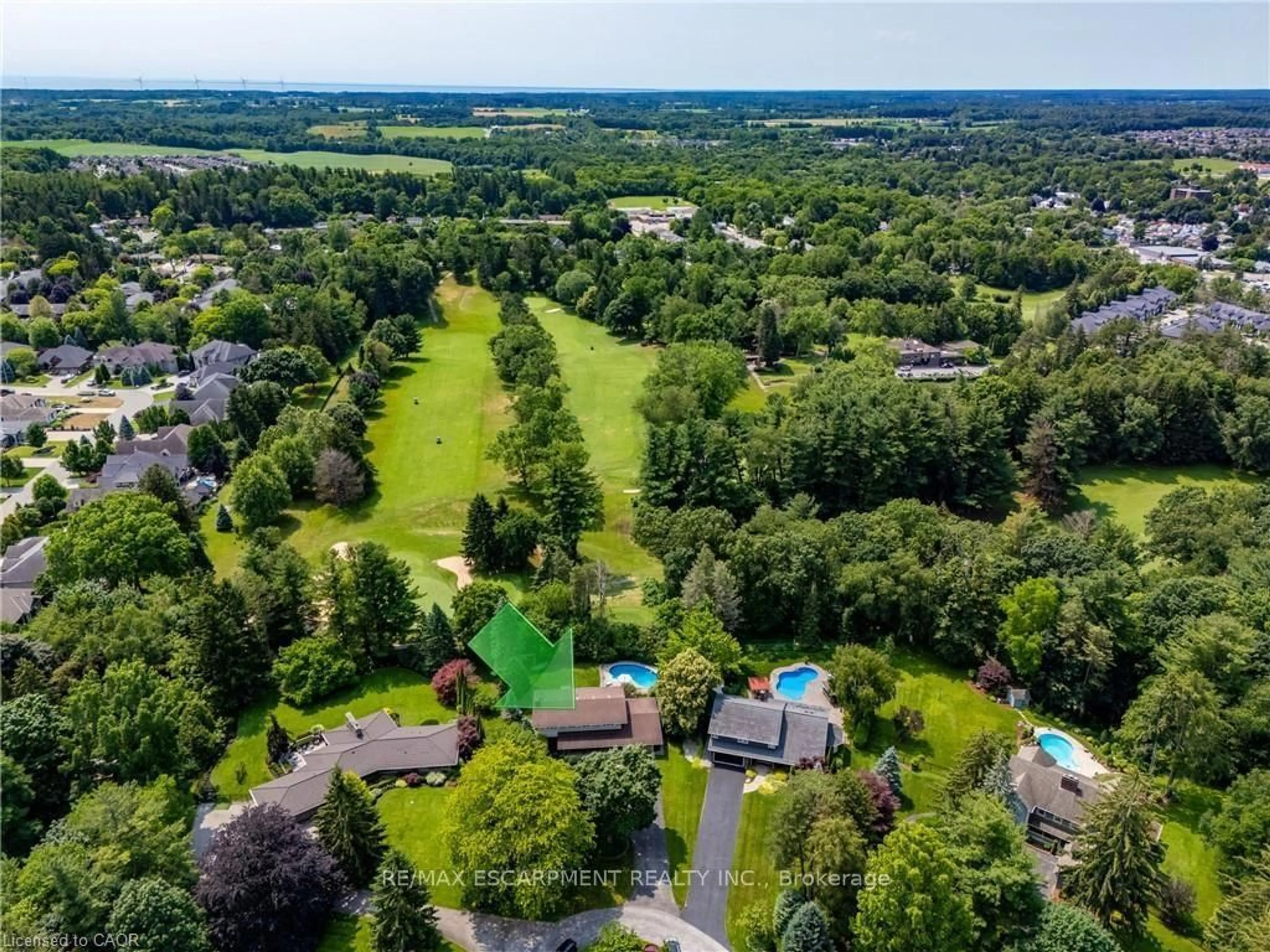 A pic from outside/outdoor area/front of a property/back of a property/a pic from drone, forest/trees view for 6 Summit Circ, Norfolk Ontario N3Y 3K8