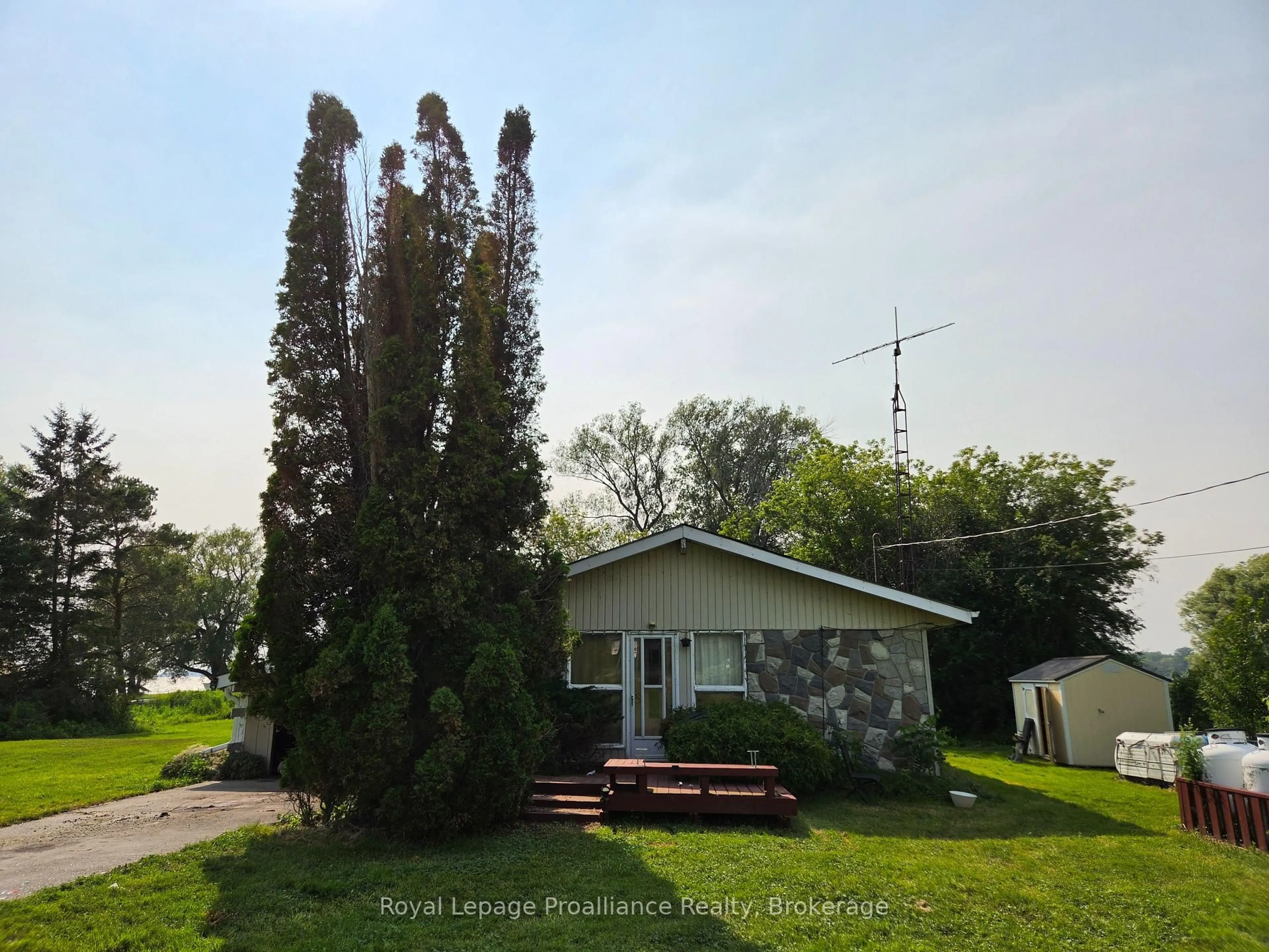 A pic from outside/outdoor area/front of a property/back of a property/a pic from drone, street for 311 B County Rd 29, Prince Edward County Ontario K0K 1T0