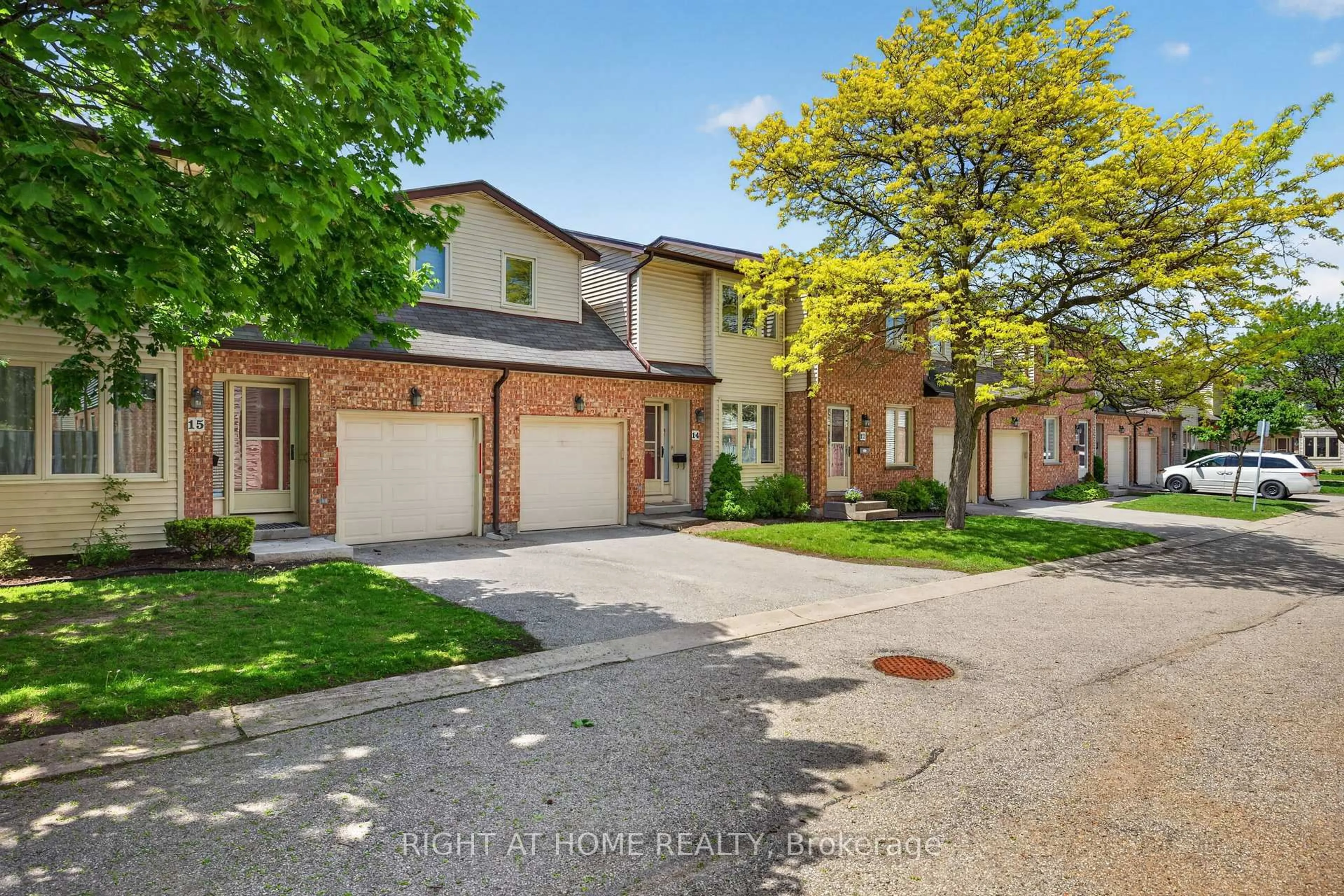 A pic from outside/outdoor area/front of a property/back of a property/a pic from drone, street for 308 Conway Dr #14, London South Ontario N6E 3N9