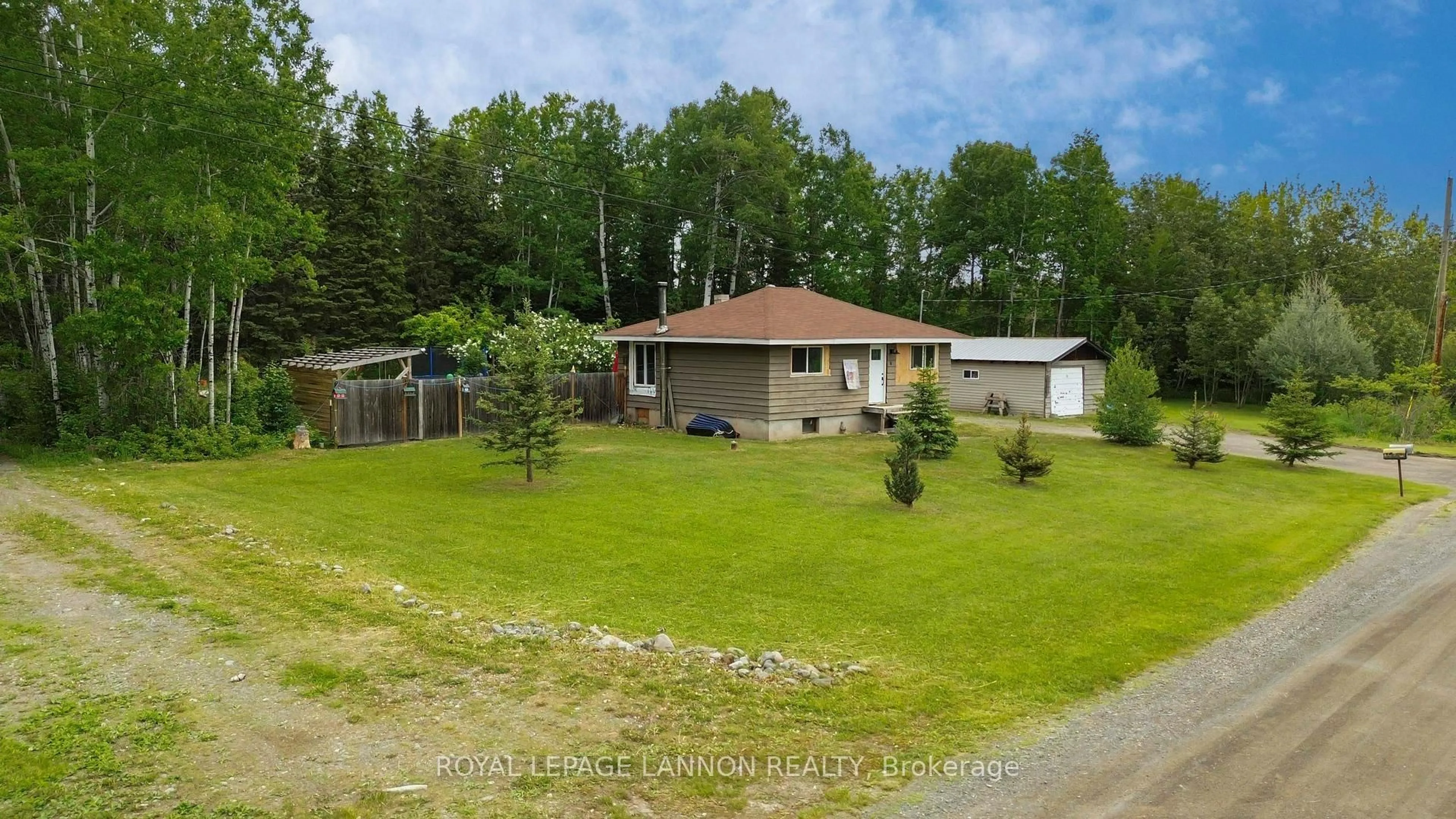 A pic from outside/outdoor area/front of a property/back of a property/a pic from drone, unknown for 6 Hume Rd W, Conmee Ontario P0T 1W0