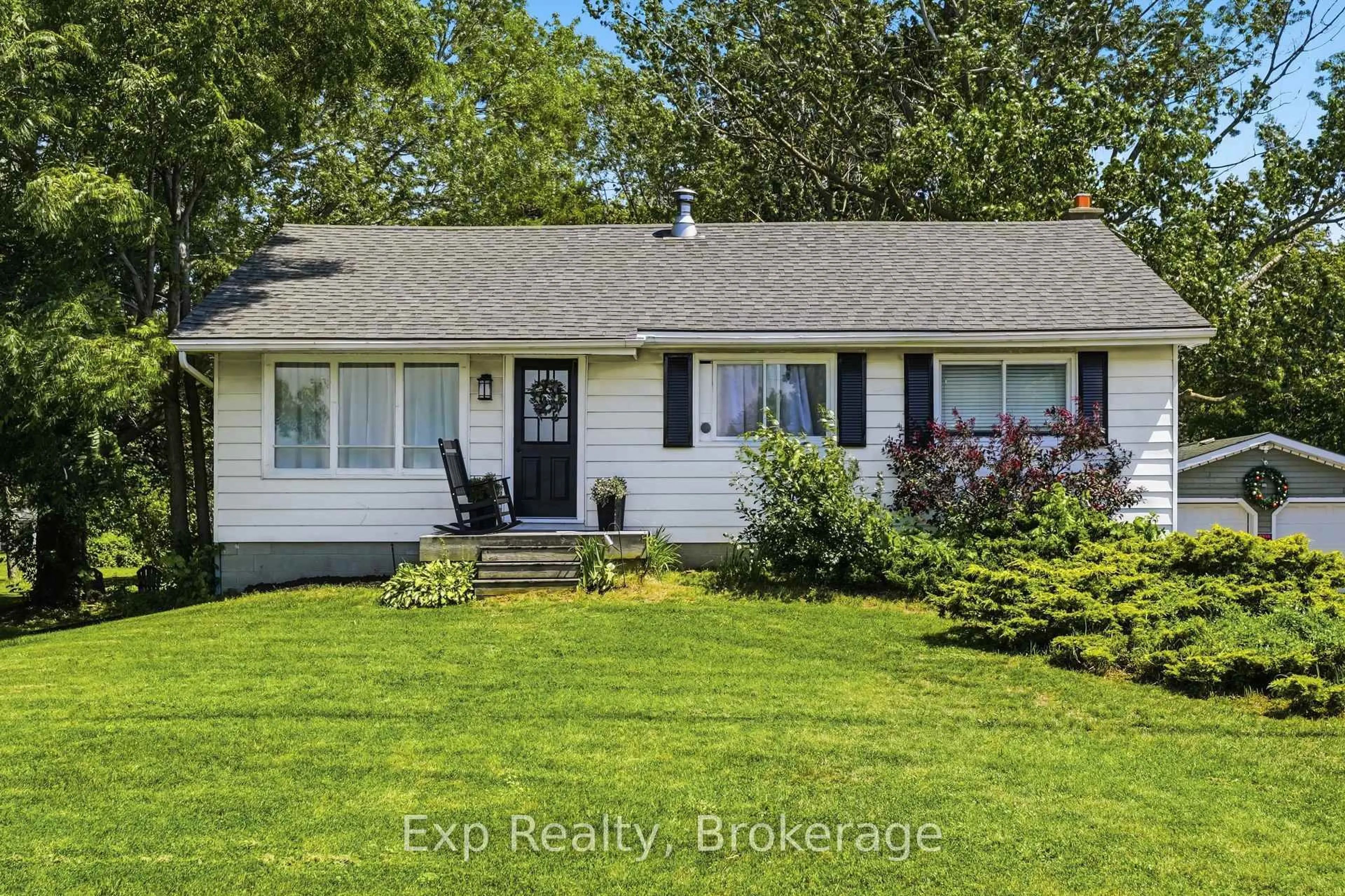 Home with vinyl exterior material, street for 650 County Road 5, Prince Edward County Ontario K0K 2T0