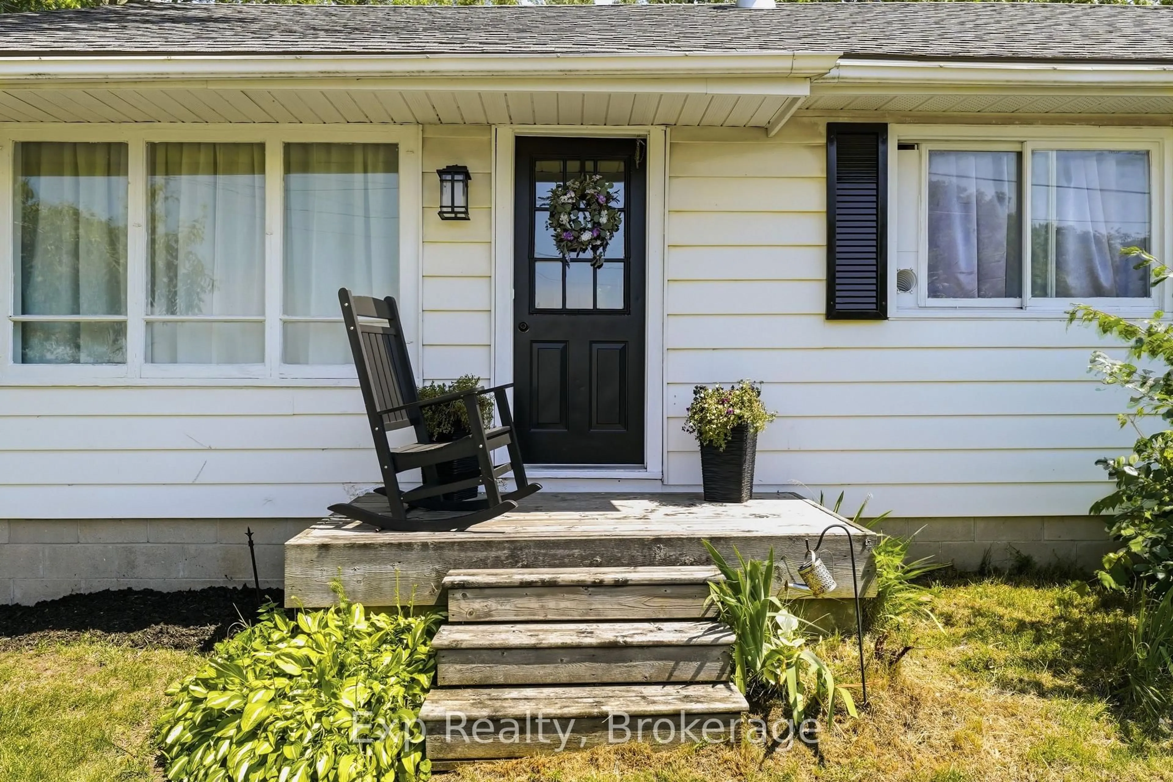 Home with vinyl exterior material, street for 650 County Road 5, Prince Edward County Ontario K0K 2T0