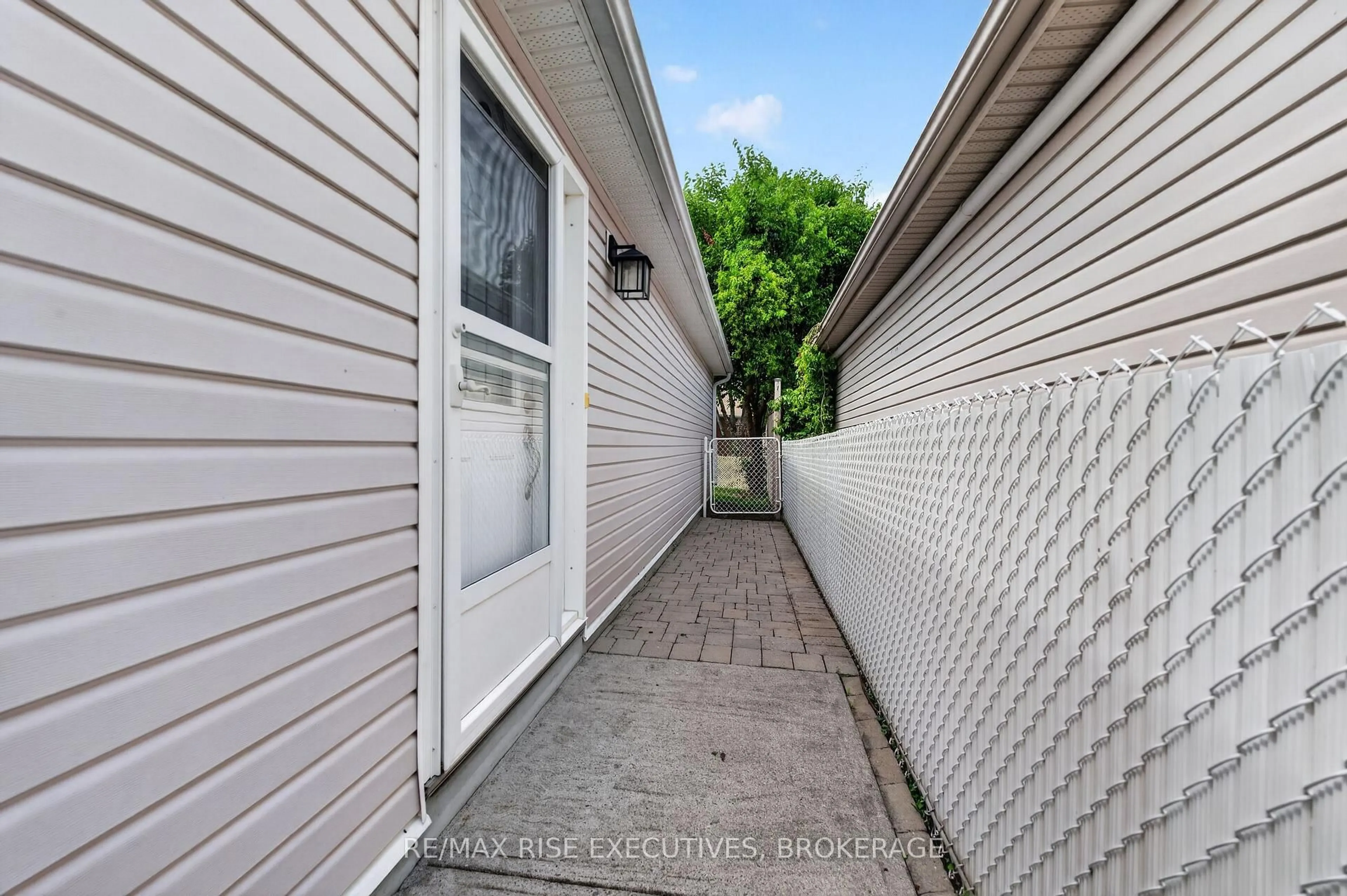 Home with vinyl exterior material, street for 956 Ringstead St, Kingston Ontario K7M 8V2