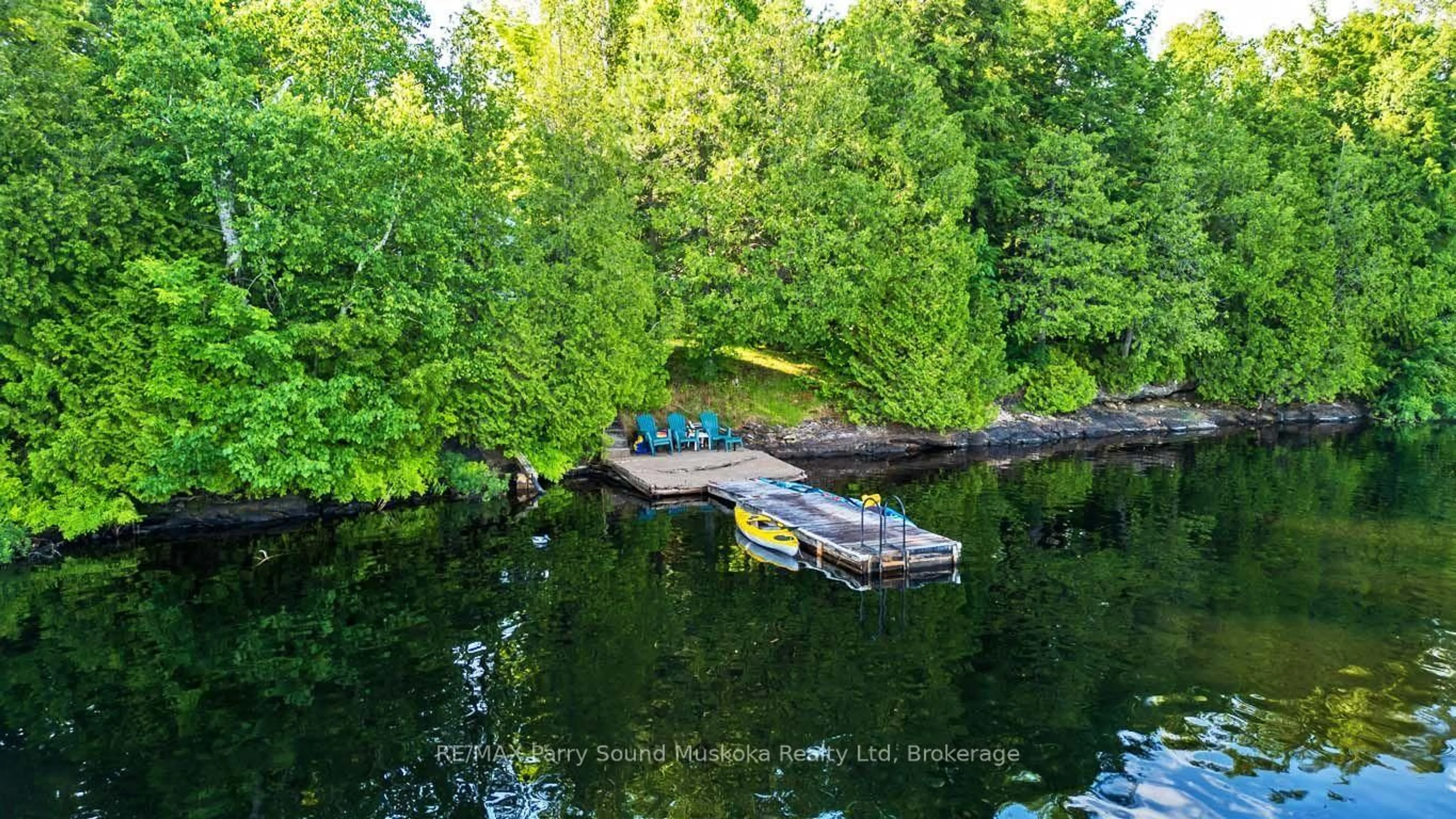 A pic from outside/outdoor area/front of a property/back of a property/a pic from drone, water/lake/river/ocean view for 408 Chur Lee Rd, Whitestone Ontario P0A 1G0