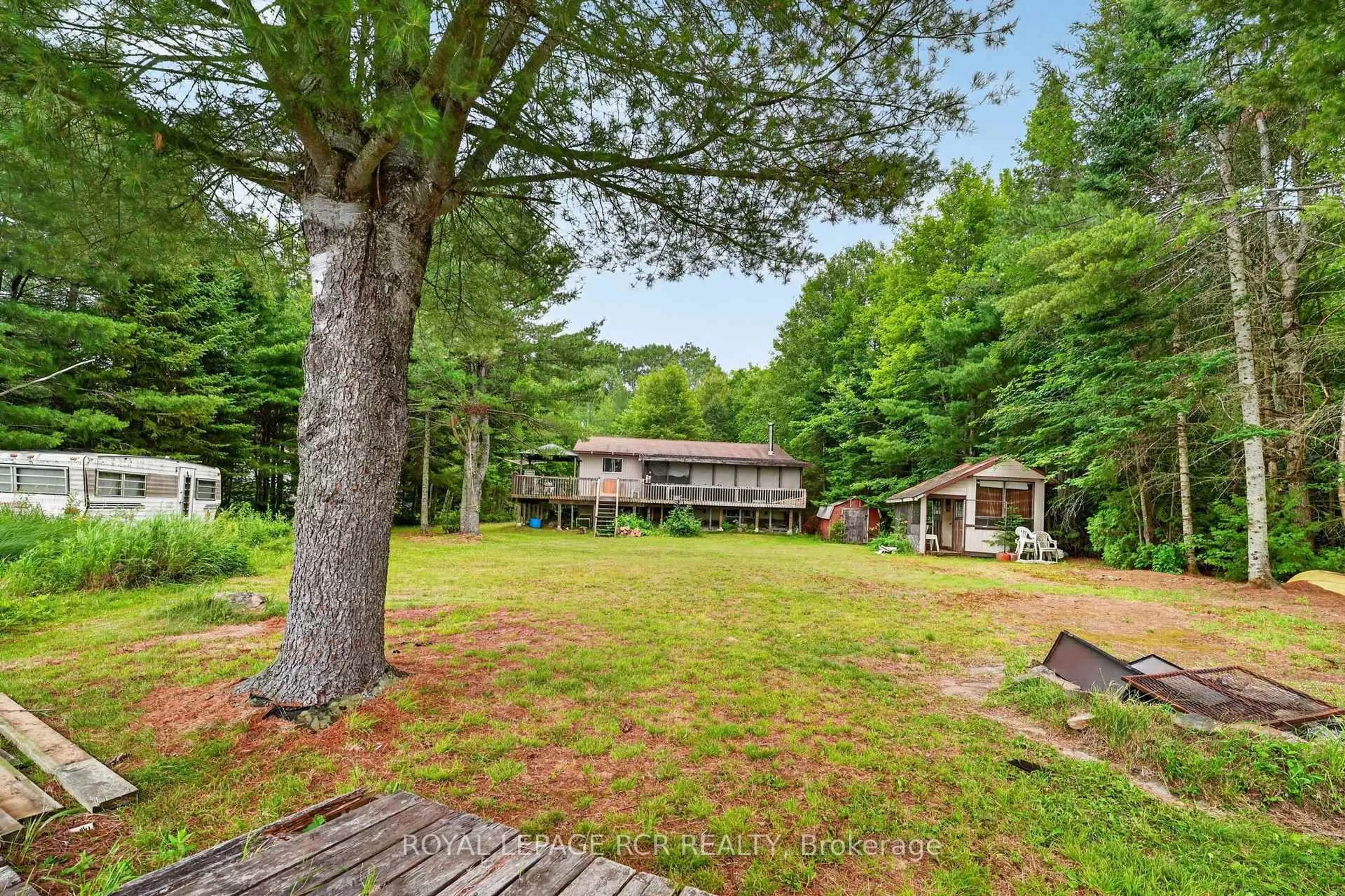 Patio, forest/trees view for 1101 Peter Rd, Bracebridge Ontario P1L 1X3