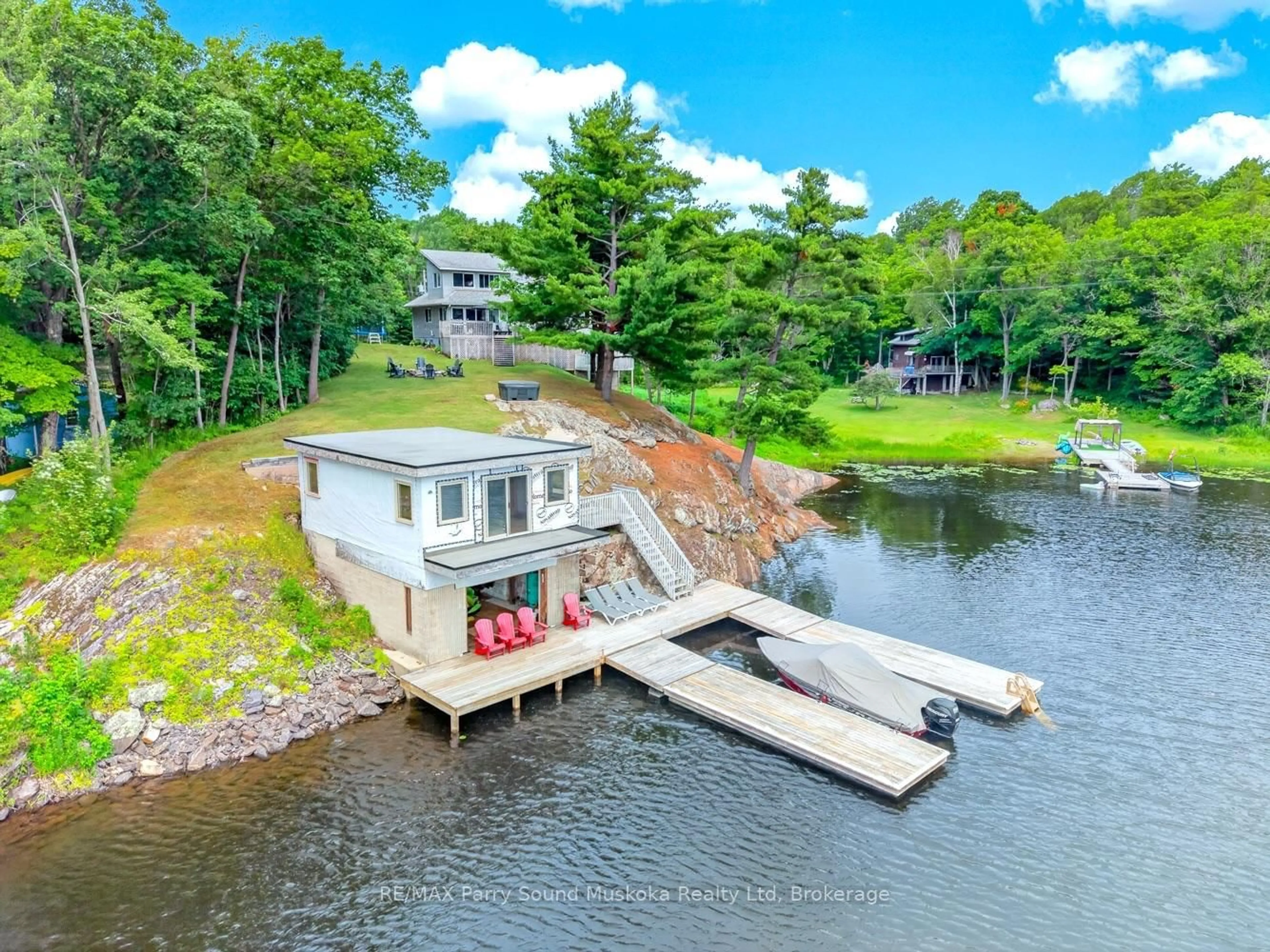 A pic from outside/outdoor area/front of a property/back of a property/a pic from drone, water/lake/river/ocean view for 39 Fred Dubie Rd, Carling Ontario P0G 1G0