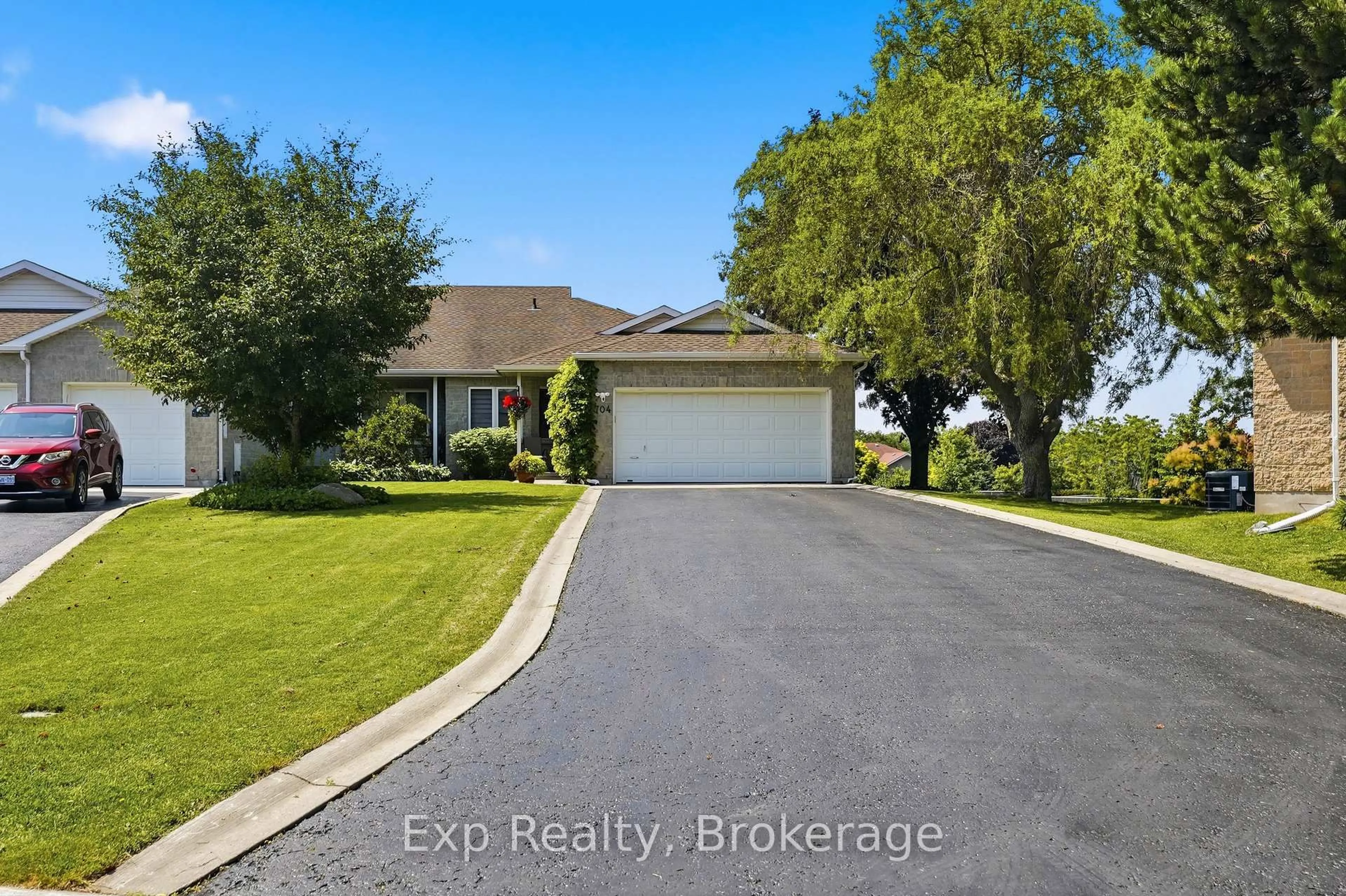 A pic from outside/outdoor area/front of a property/back of a property/a pic from drone, water/lake/river/ocean view for 704 Millwood Dr, Kingston Ontario K7M 8Z1
