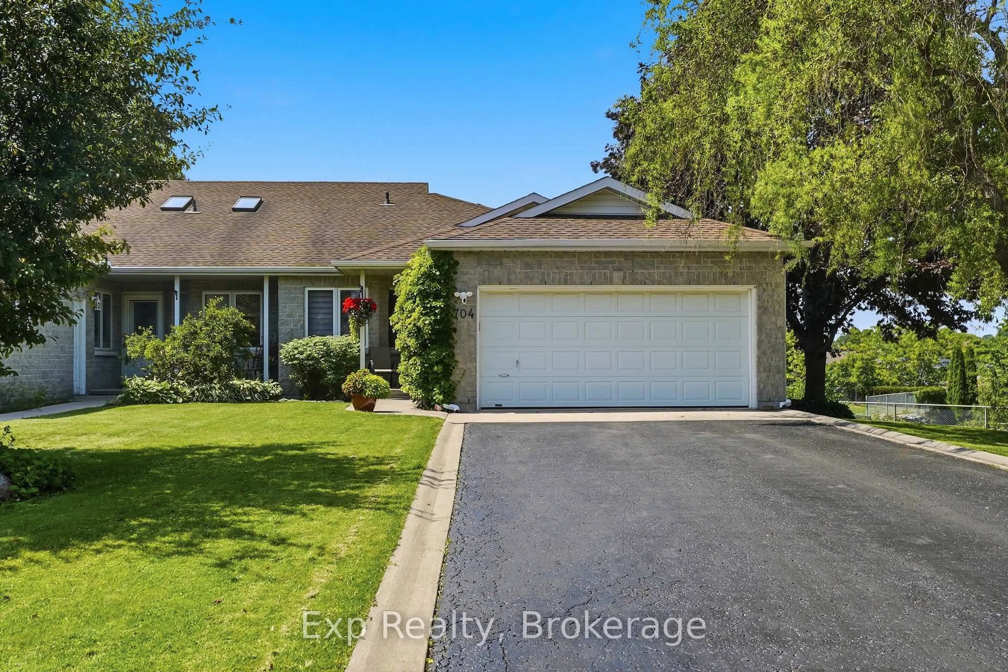 A pic from outside/outdoor area/front of a property/back of a property/a pic from drone, street for 704 Millwood Dr, Kingston Ontario K7M 8Z1