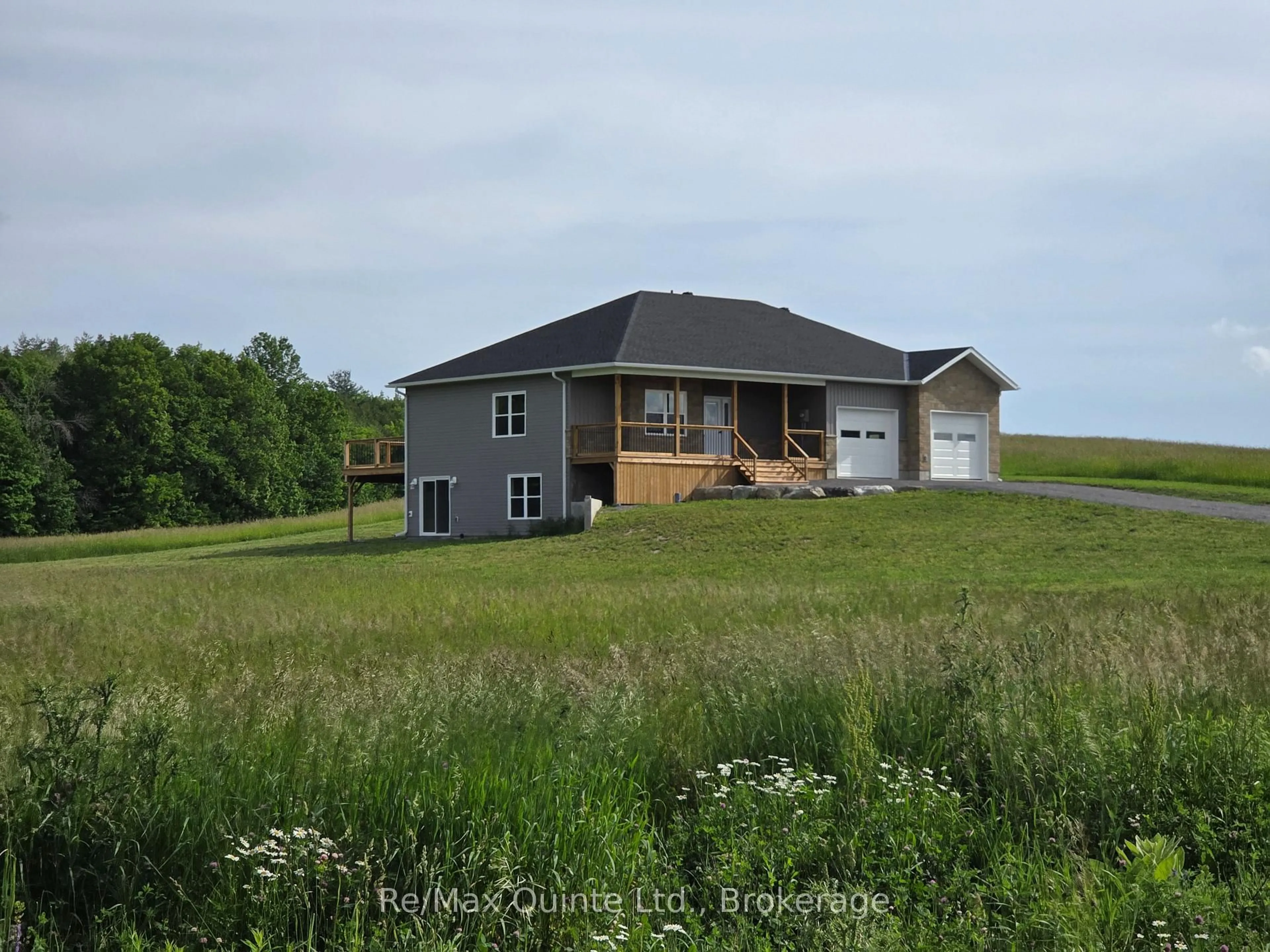 A pic from outside/outdoor area/front of a property/back of a property/a pic from drone, water/lake/river/ocean view for 202 Windmill Rd, Thomasburg Ontario K0K 3H0