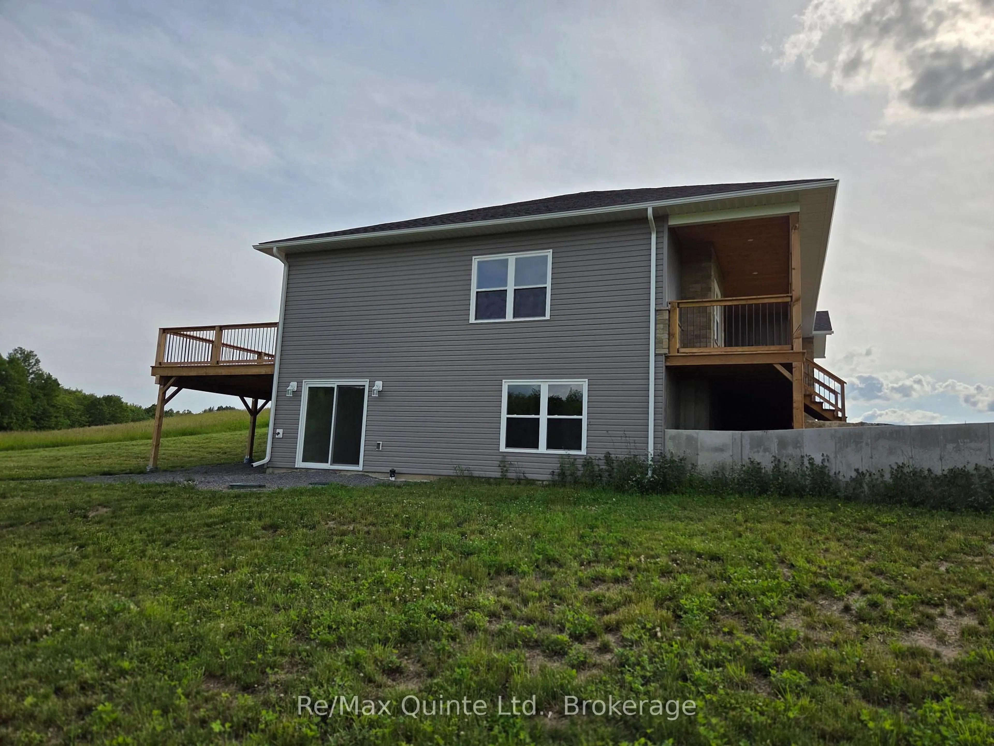 A pic from outside/outdoor area/front of a property/back of a property/a pic from drone, water/lake/river/ocean view for 202 Windmill Rd, Thomasburg Ontario K0K 3H0