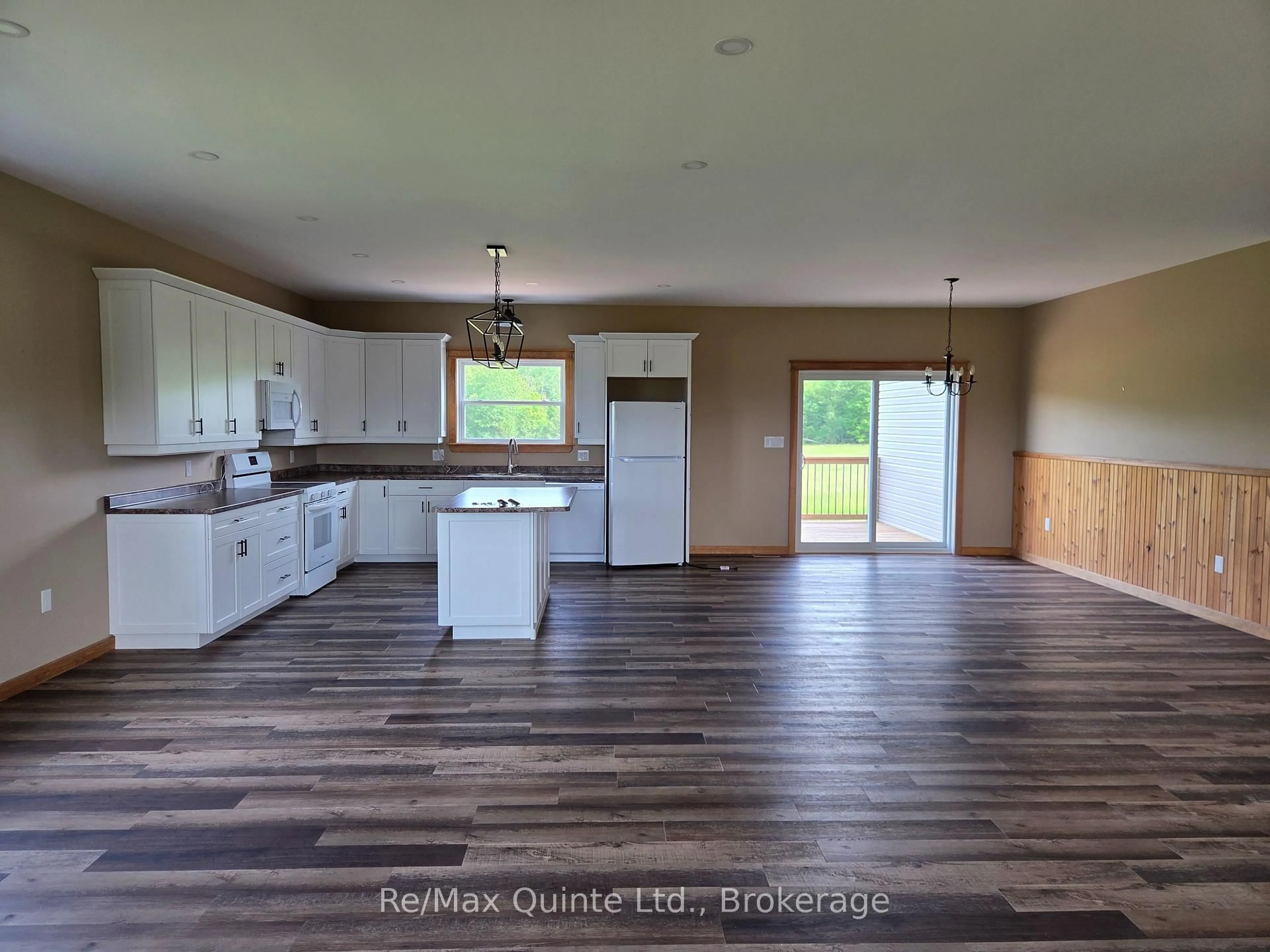 Open concept kitchen, wood/laminate floor for 202 Windmill Rd, Thomasburg Ontario K0K 3H0