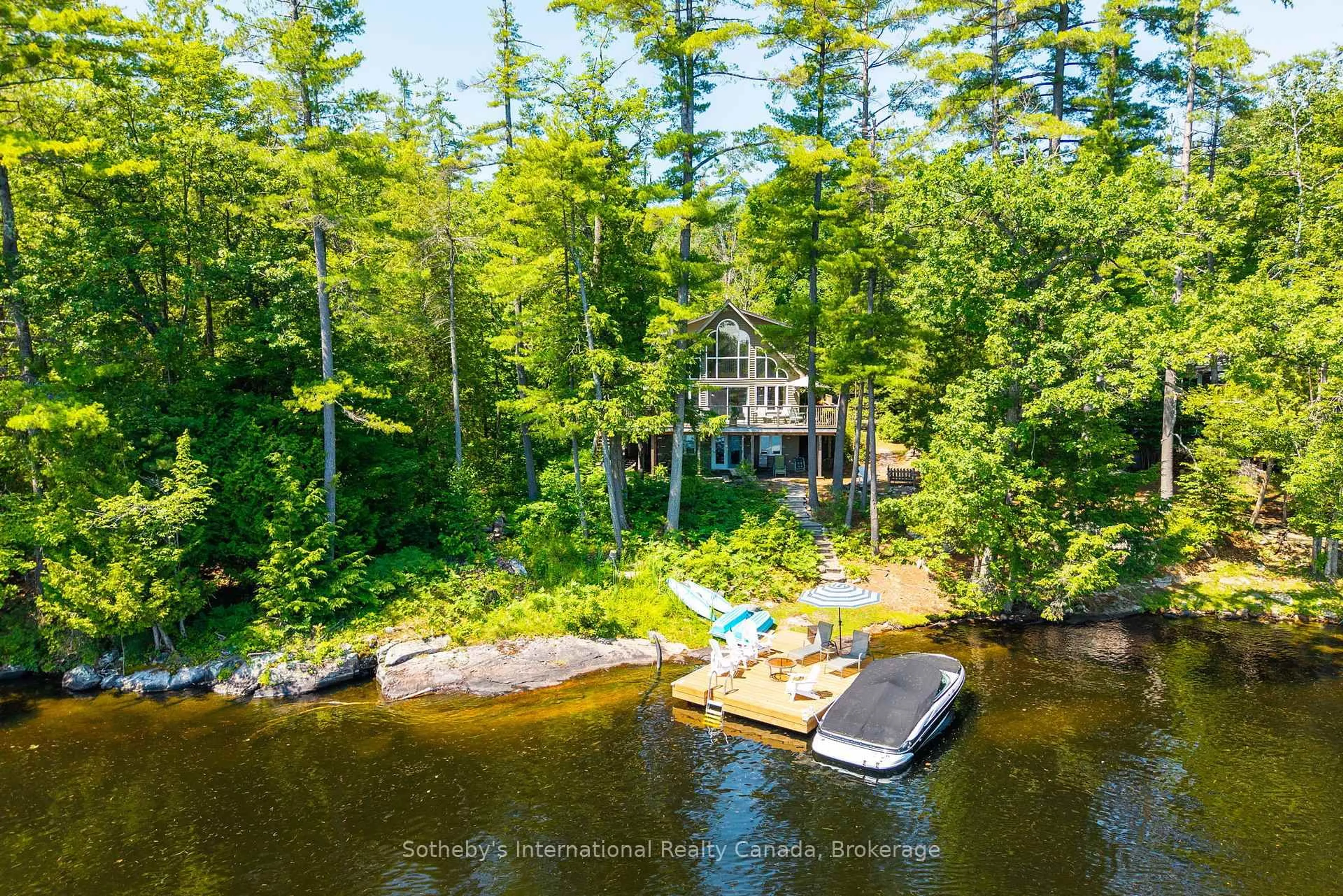 A pic from outside/outdoor area/front of a property/back of a property/a pic from drone, water/lake/river/ocean view for 1145 Pine Needle Point Rd, Muskoka Lakes Ontario P1P 1R2