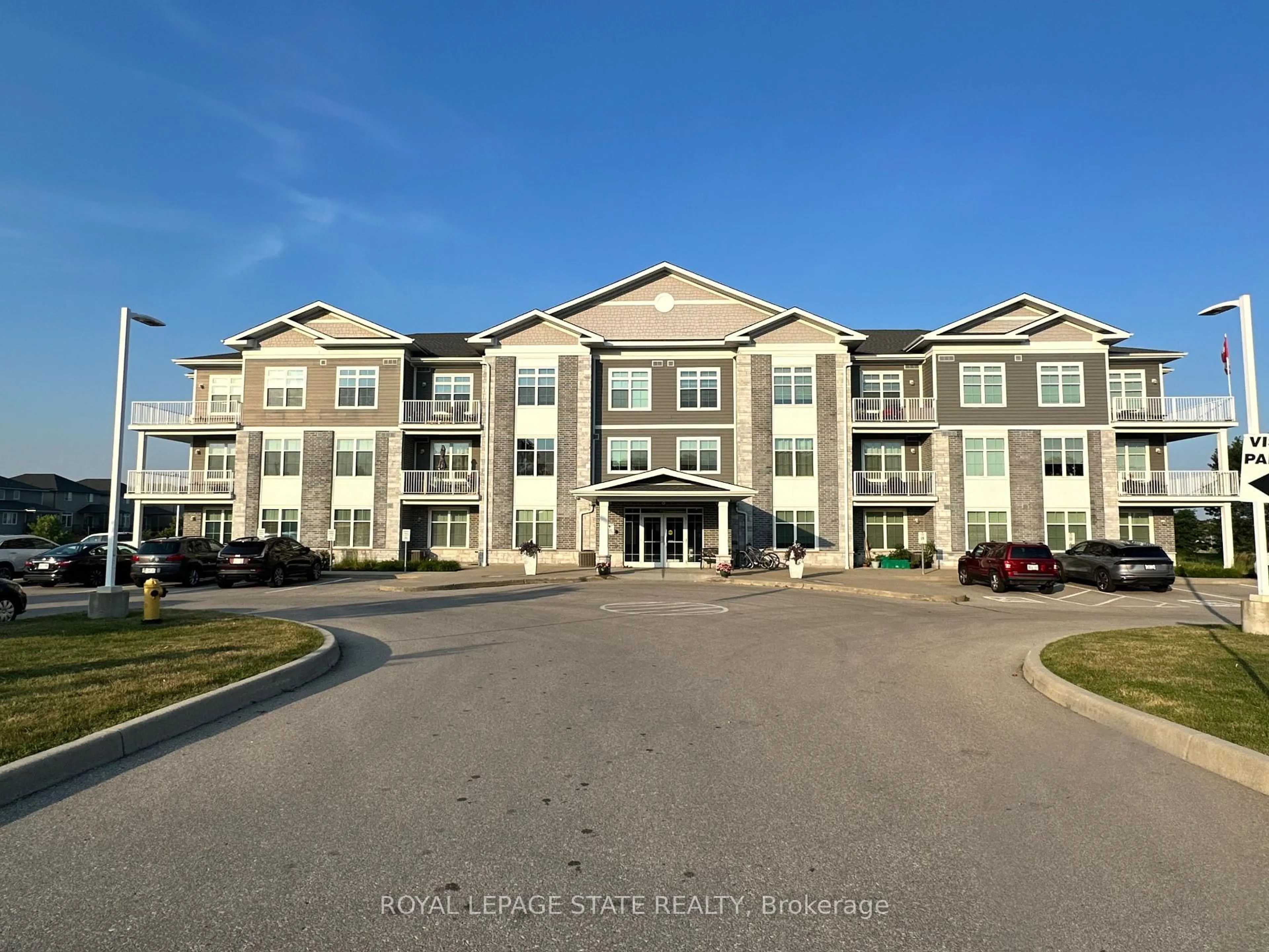 A pic from outside/outdoor area/front of a property/back of a property/a pic from drone, building for 14 Saunders Dr #307, Haldimand Ontario N0A 1J0