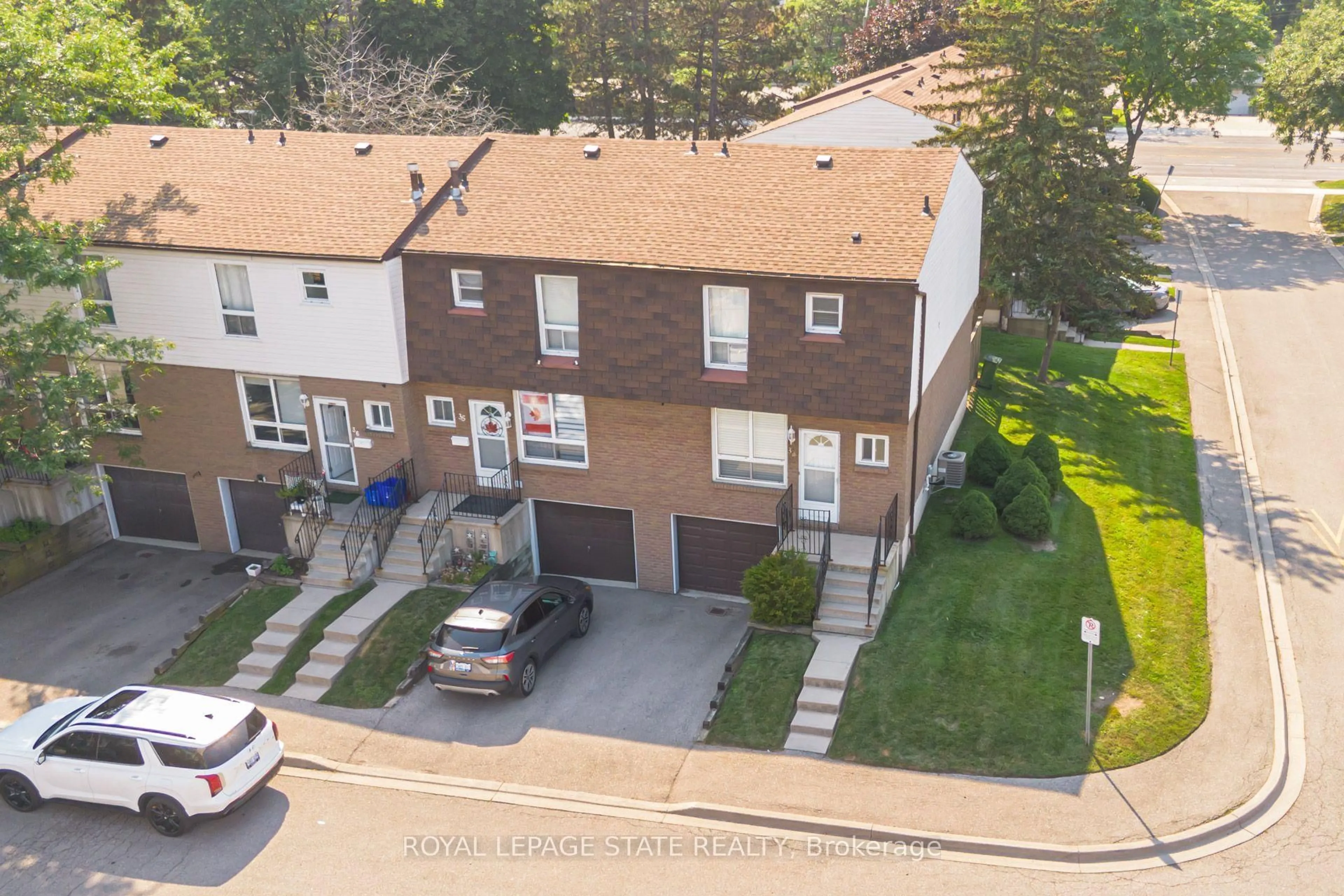 A pic from outside/outdoor area/front of a property/back of a property/a pic from drone, street for 1301 Upper Gage Ave #34, Hamilton Ontario L8W 1E5