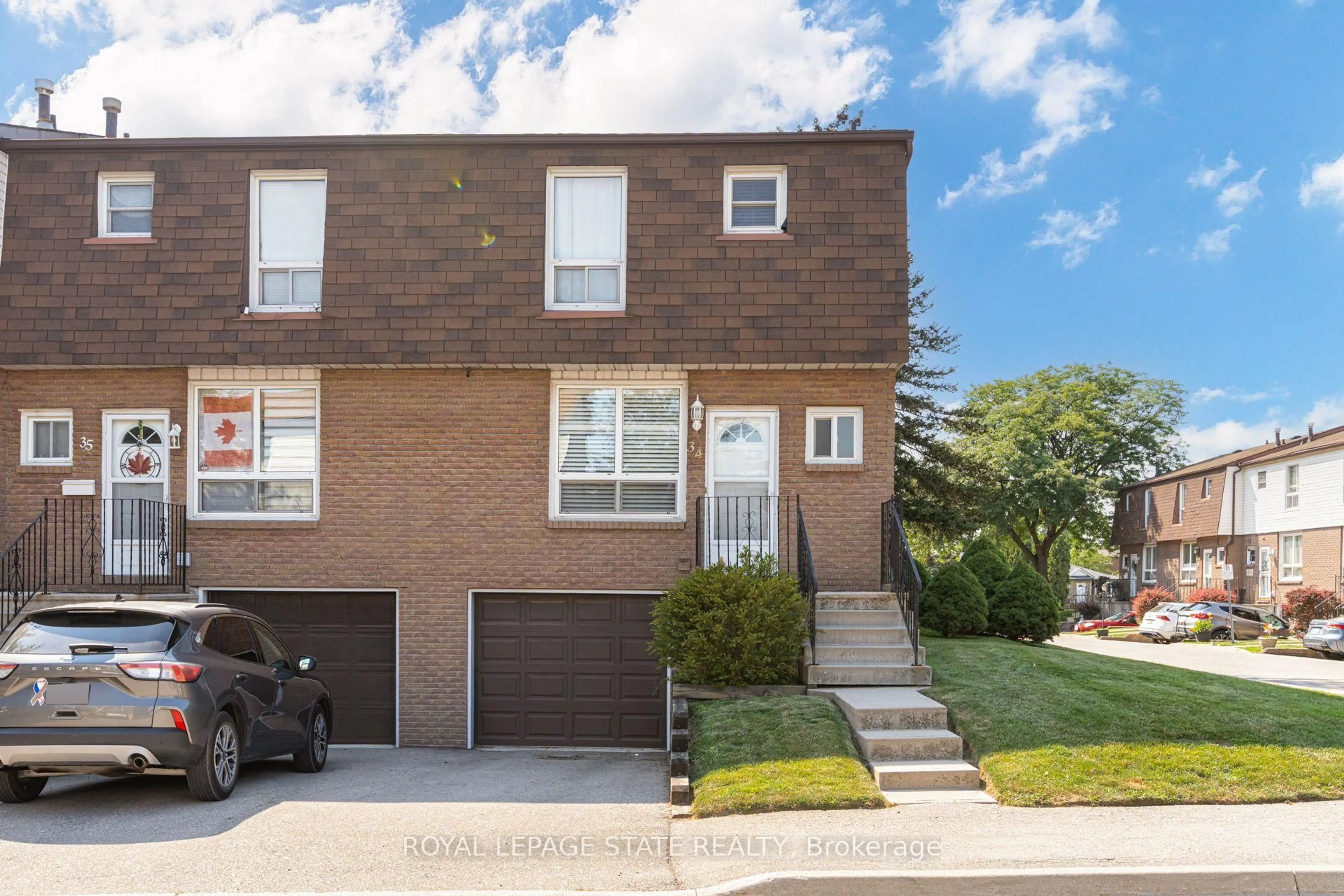 Home with brick exterior material, street for 1301 Upper Gage Ave #34, Hamilton Ontario L8W 1E5