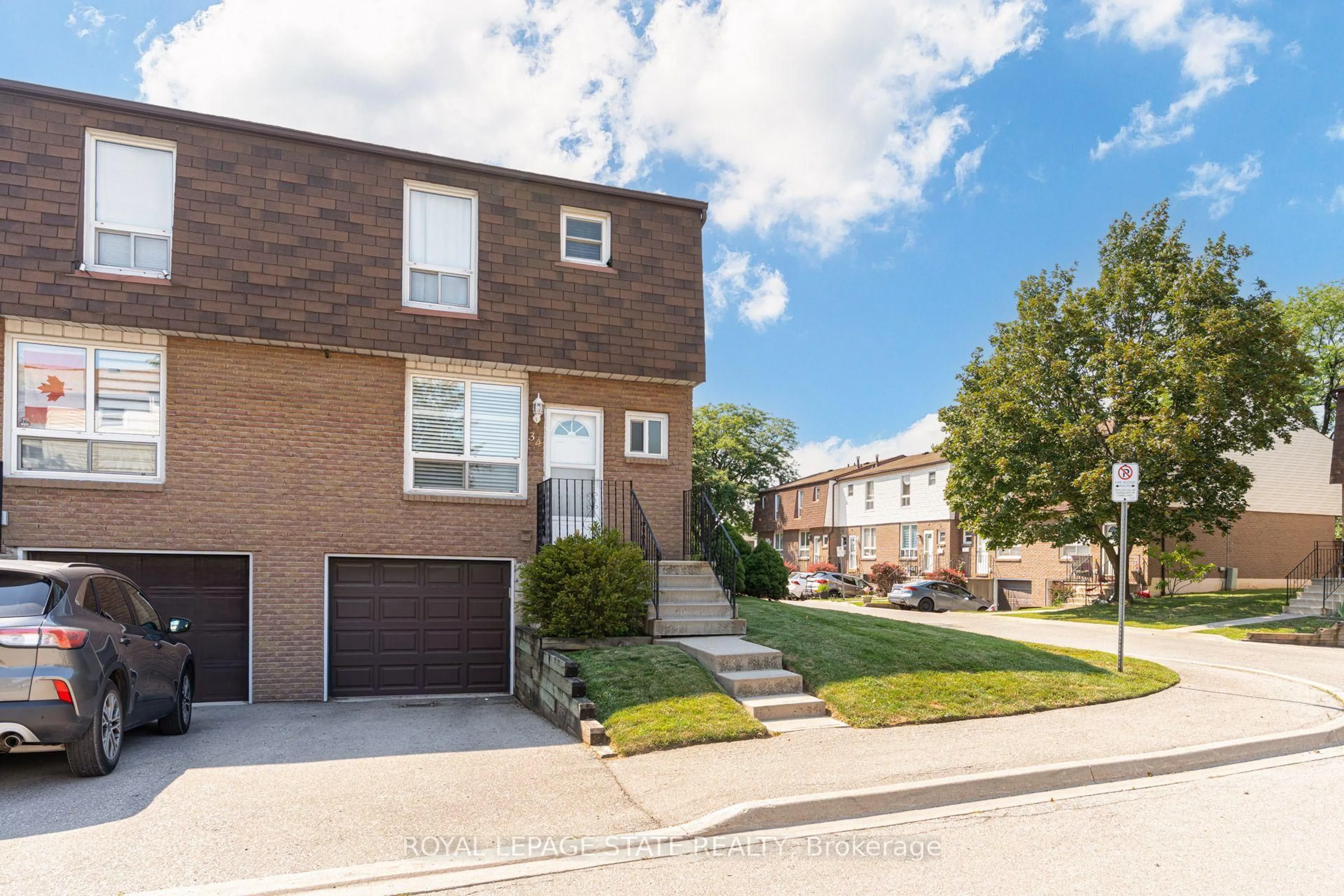 Home with brick exterior material, street for 1301 Upper Gage Ave #34, Hamilton Ontario L8W 1E5