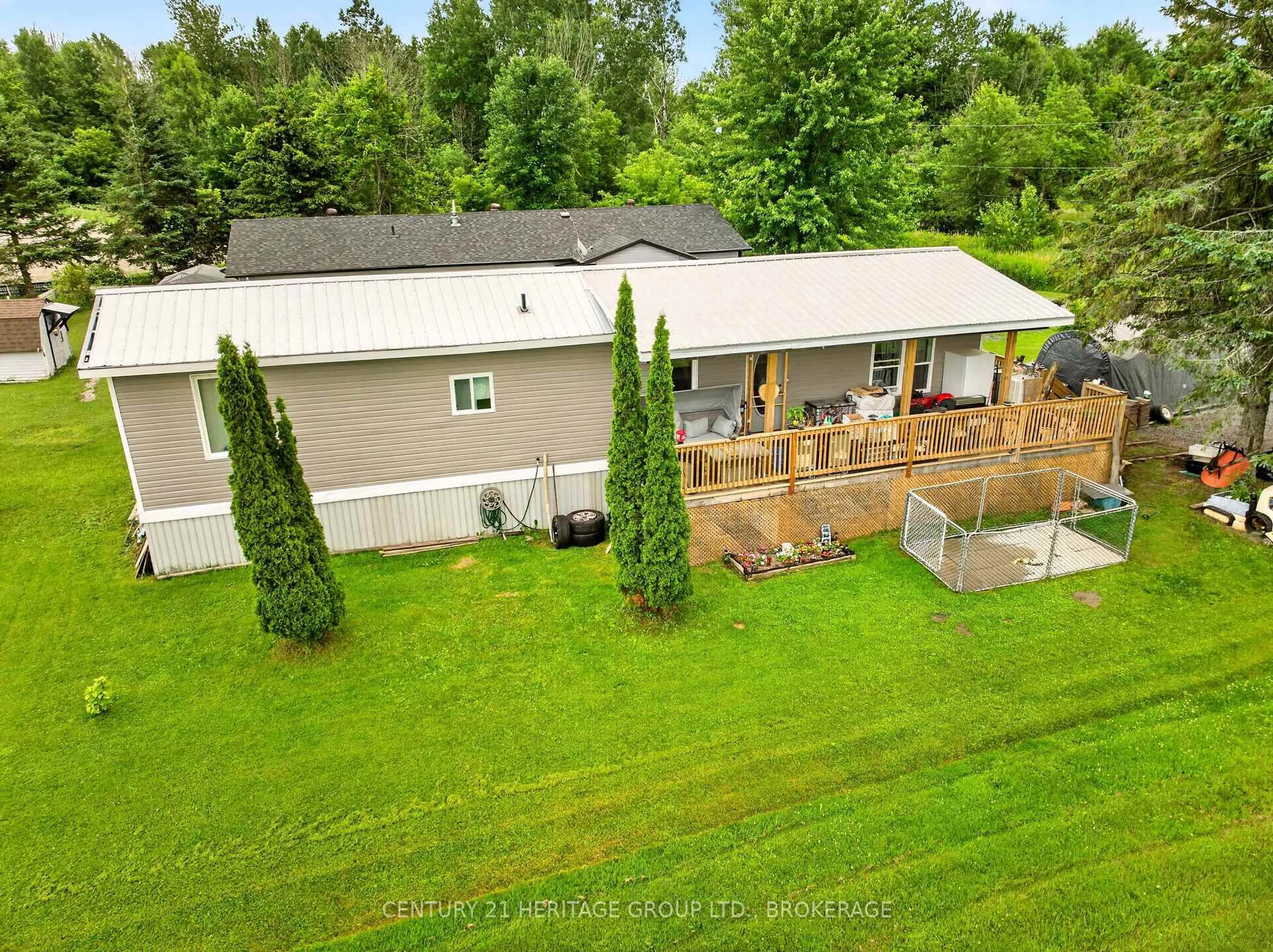 A pic from outside/outdoor area/front of a property/back of a property/a pic from drone, unknown for 7 PATTERSON Rd, Rideau Lakes Ontario K0G 1E0