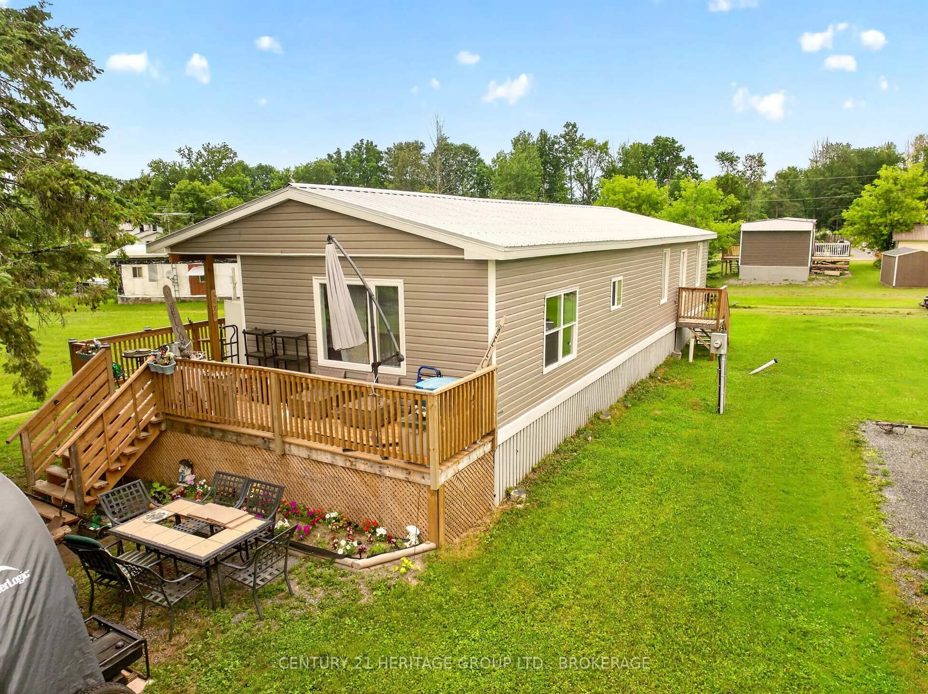 A pic from outside/outdoor area/front of a property/back of a property/a pic from drone, unknown for 7 PATTERSON Rd, Rideau Lakes Ontario K0G 1E0