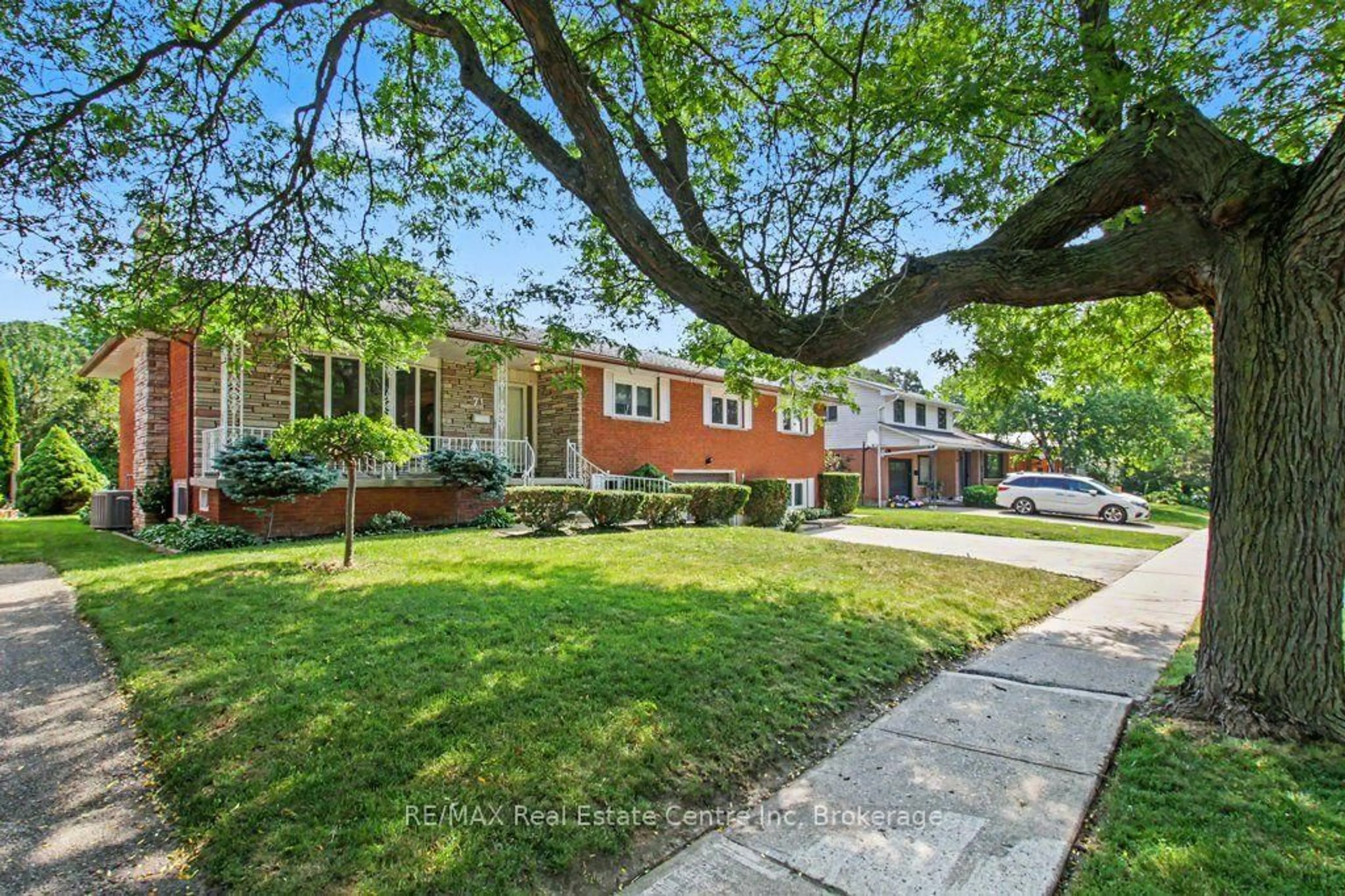 Home with brick exterior material, street for 71 Renfield St, Guelph Ontario N1E 4A3