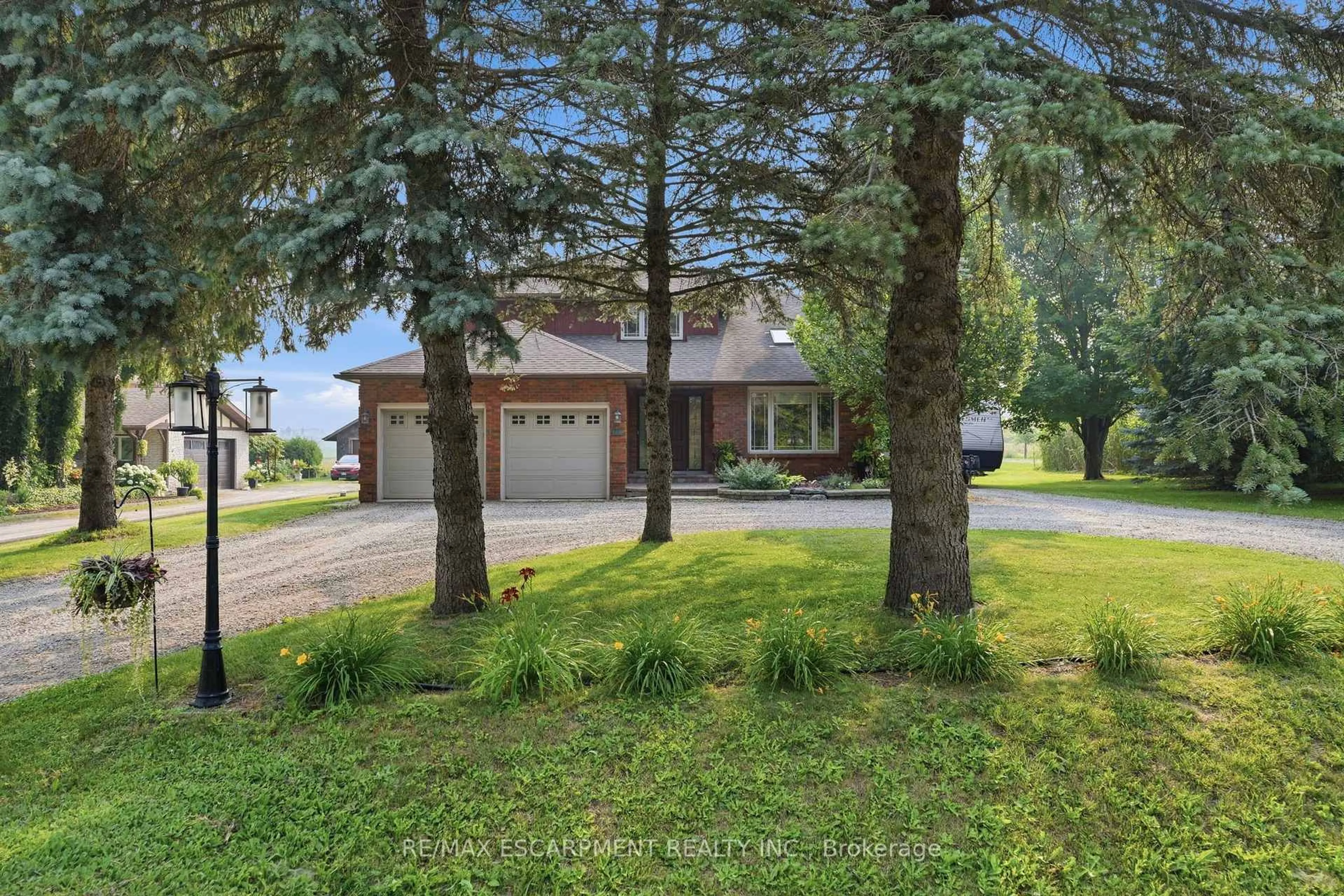A pic from outside/outdoor area/front of a property/back of a property/a pic from drone, street for 108 Highway 52, Hamilton Ontario L0R 1T0