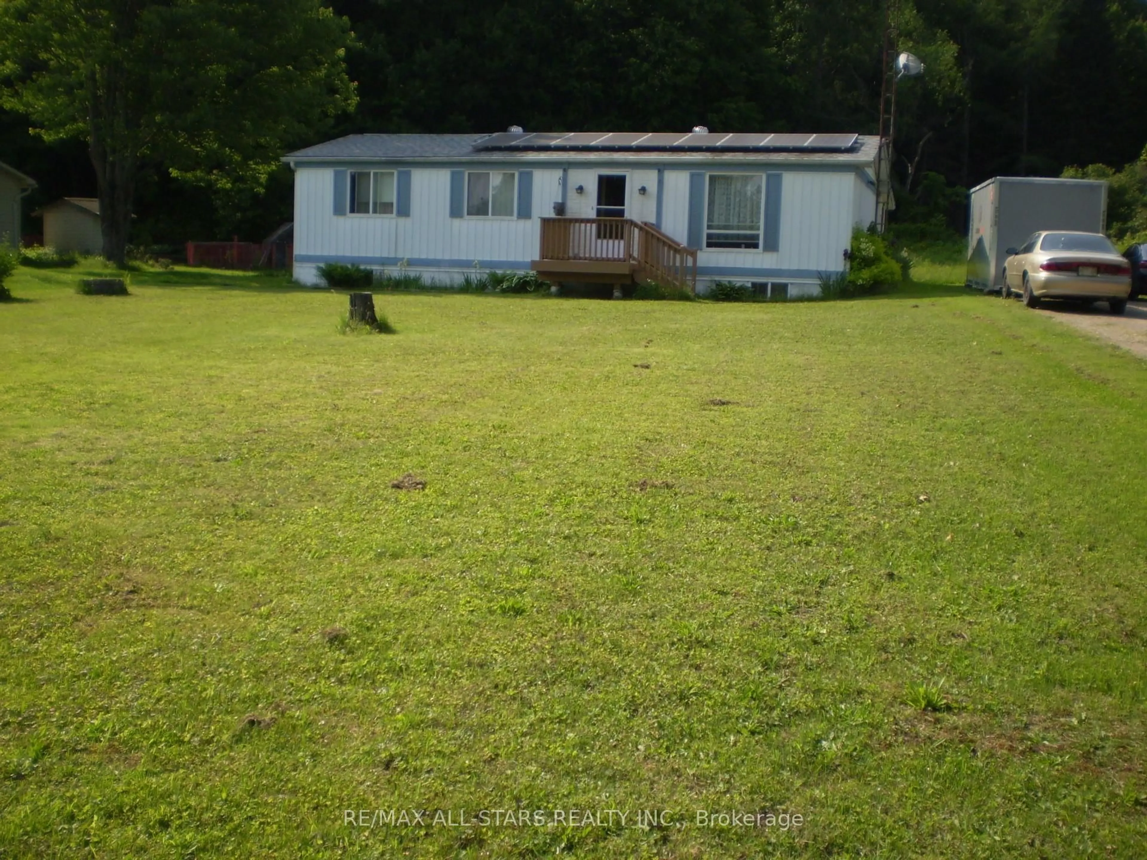 A pic from outside/outdoor area/front of a property/back of a property/a pic from drone, water/lake/river/ocean view for 1225 SPRING VALLEY Rd, Minden Hills Ontario K0M 2K0