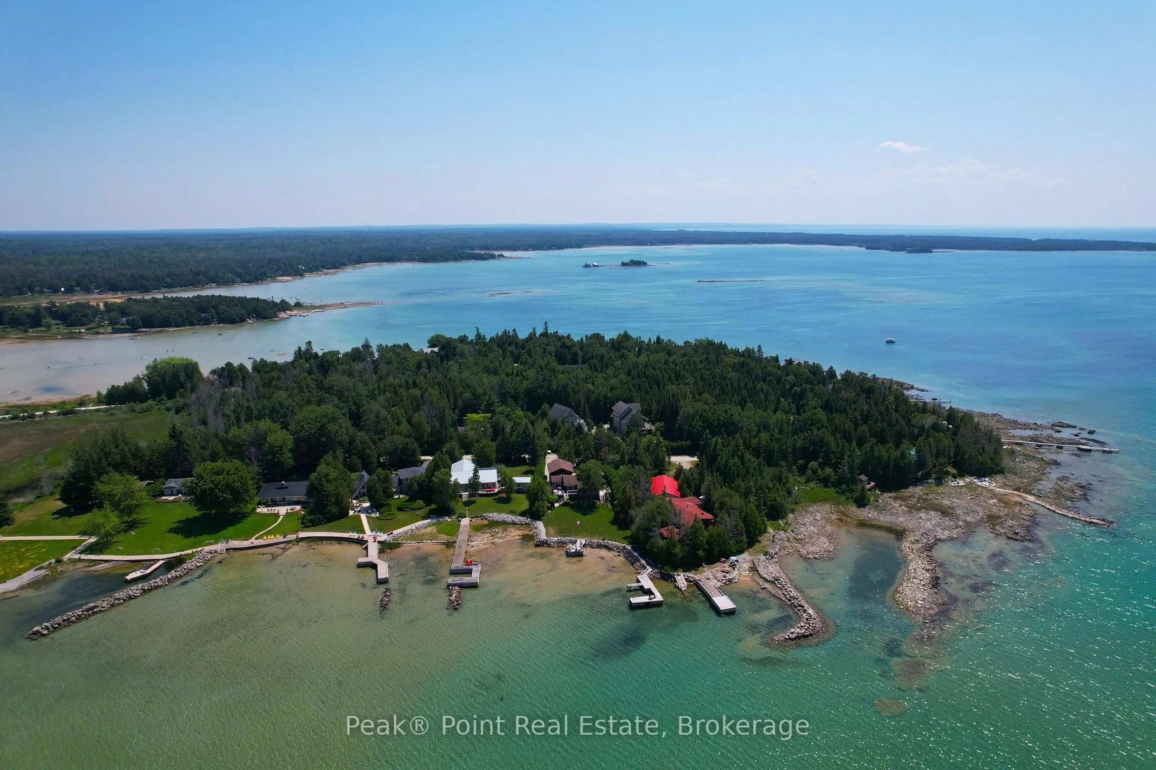 A pic from outside/outdoor area/front of a property/back of a property/a pic from drone, water/lake/river/ocean view for 71 Lonely Island Dr, South Bruce Peninsula Ontario N0H 2T0