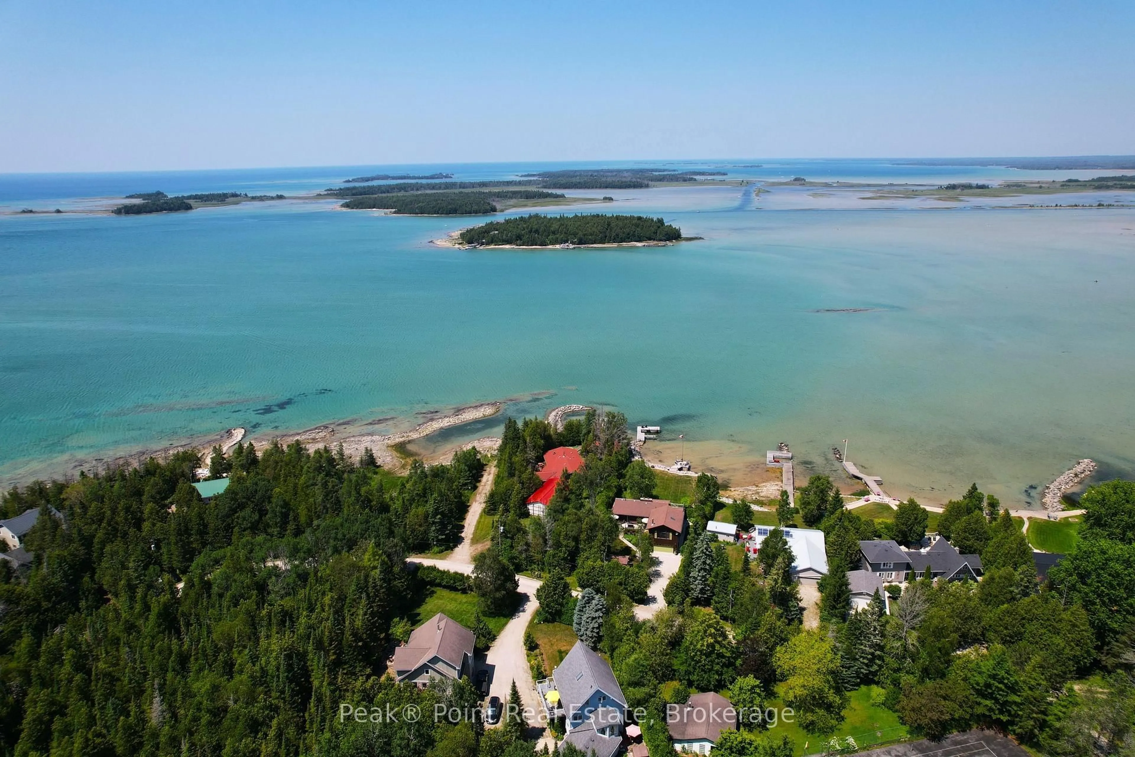 A pic from outside/outdoor area/front of a property/back of a property/a pic from drone, water/lake/river/ocean view for 71 Lonely Island Dr, South Bruce Peninsula Ontario N0H 2T0