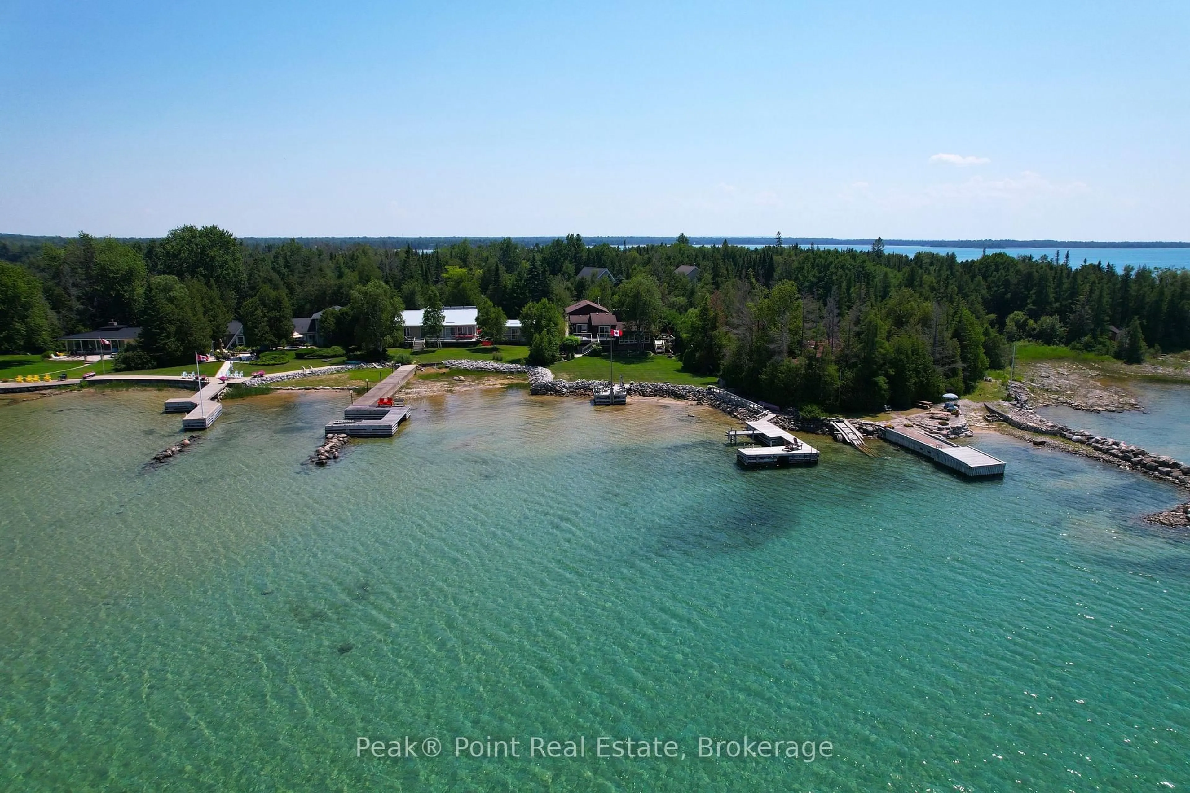 A pic from outside/outdoor area/front of a property/back of a property/a pic from drone, water/lake/river/ocean view for 71 Lonely Island Dr, South Bruce Peninsula Ontario N0H 2T0