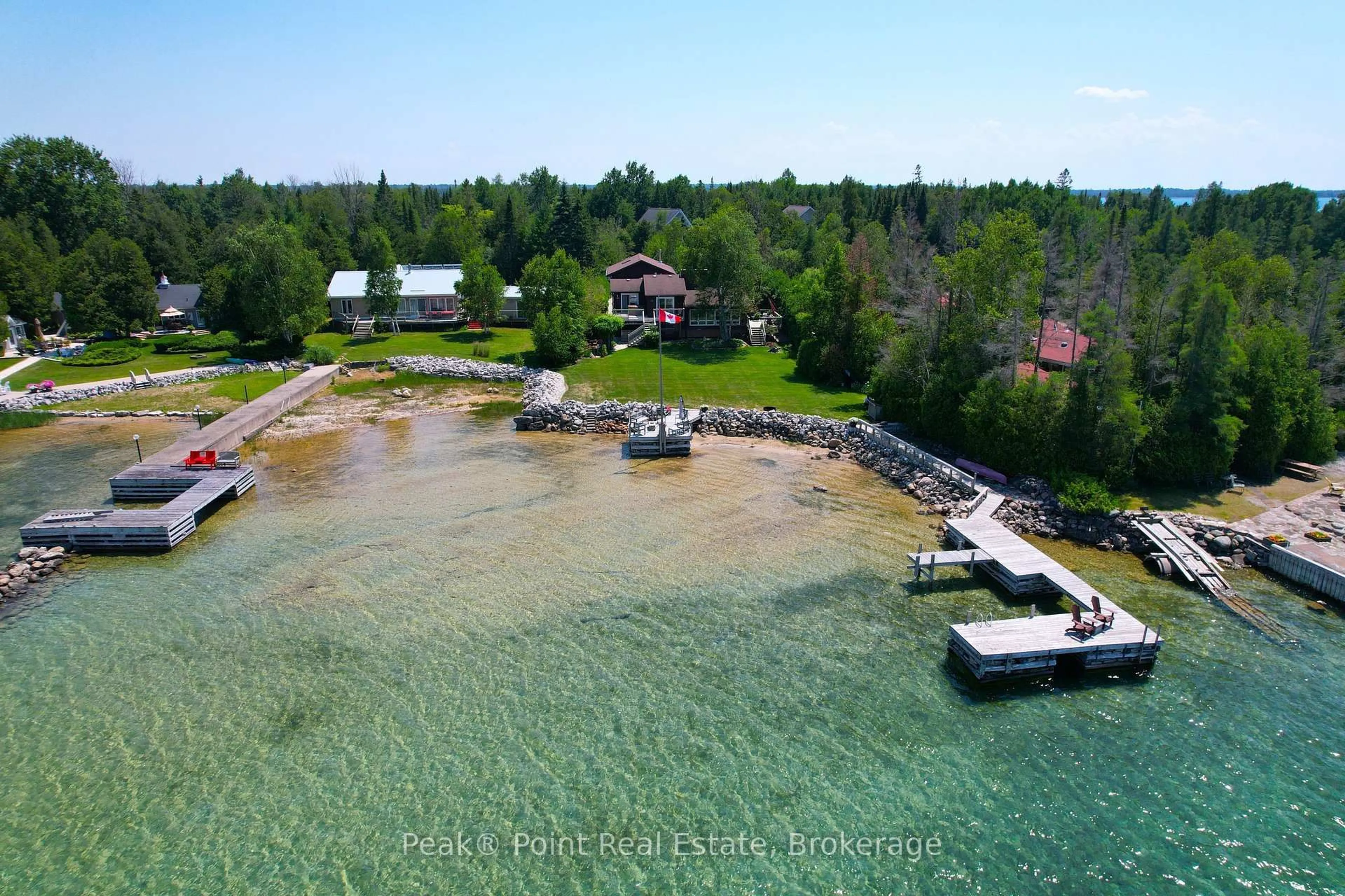 A pic from outside/outdoor area/front of a property/back of a property/a pic from drone, water/lake/river/ocean view for 71 Lonely Island Dr, South Bruce Peninsula Ontario N0H 2T0