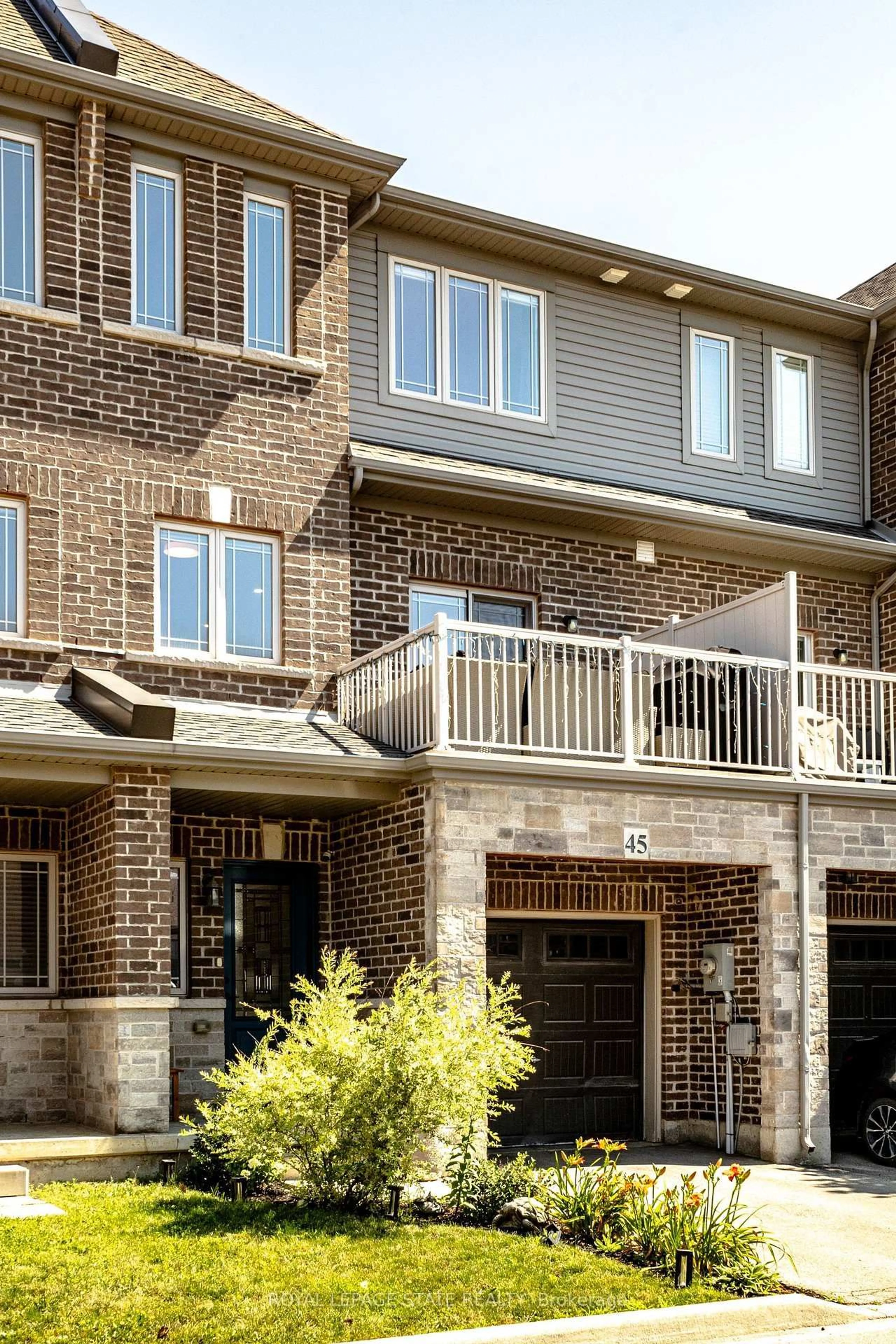 Home with brick exterior material, street for 45 Crossings Way, Hamilton Ontario L0R 1P0