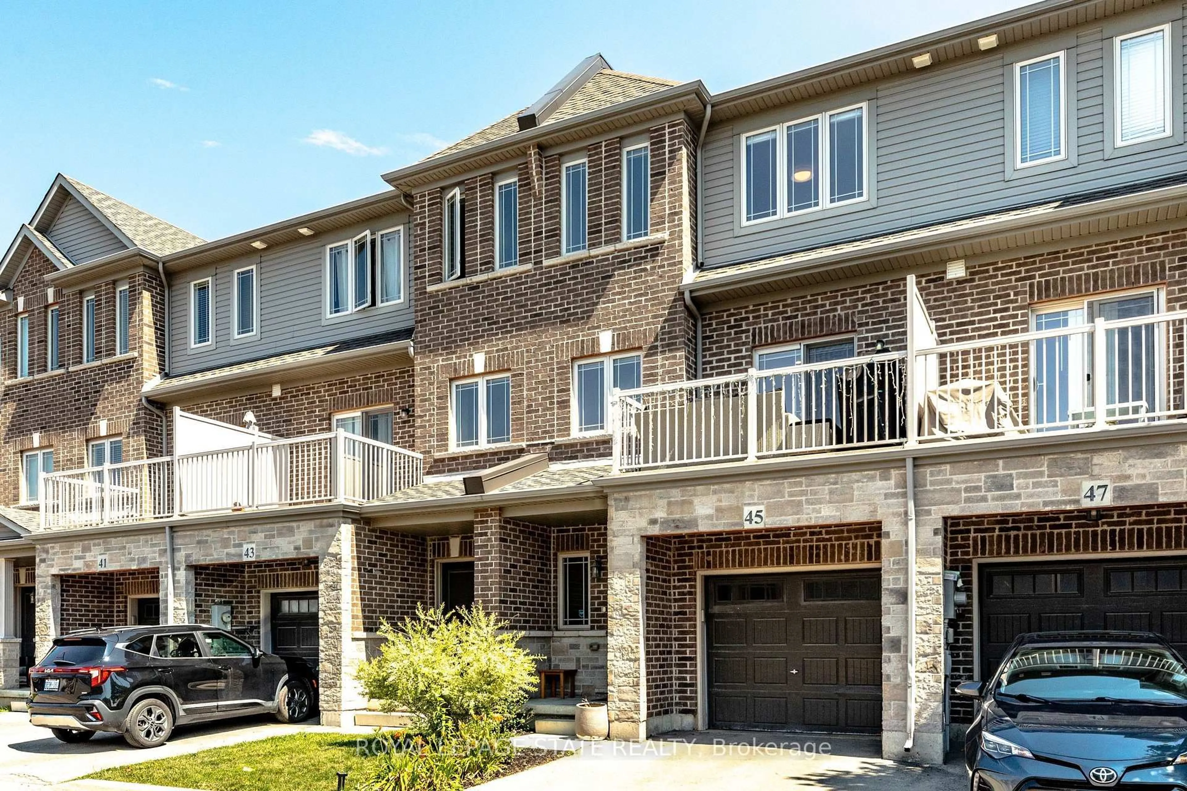 Home with brick exterior material, street for 45 Crossings Way, Hamilton Ontario L0R 1P0