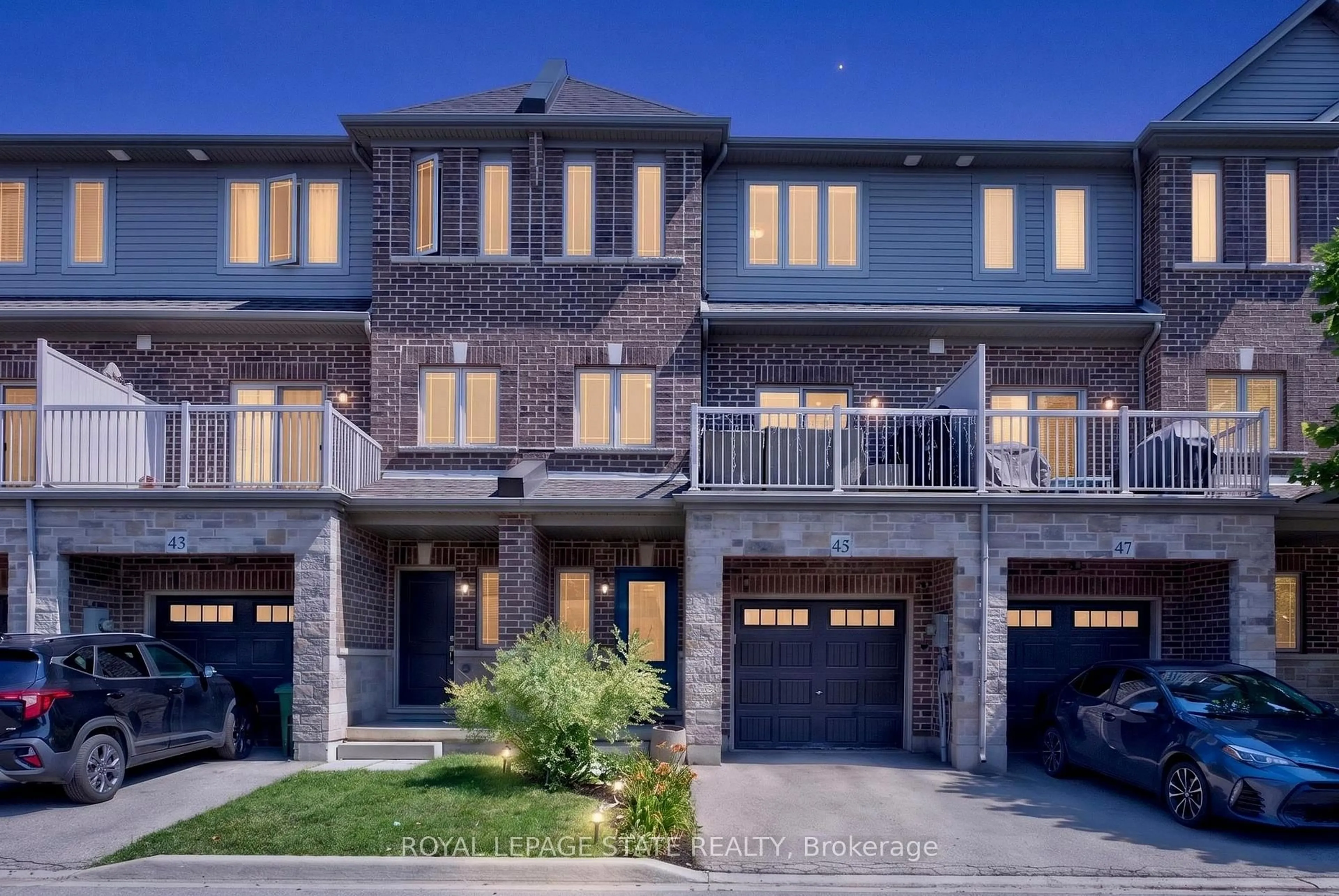 Home with brick exterior material, street for 45 Crossings Way, Hamilton Ontario L0R 1P0