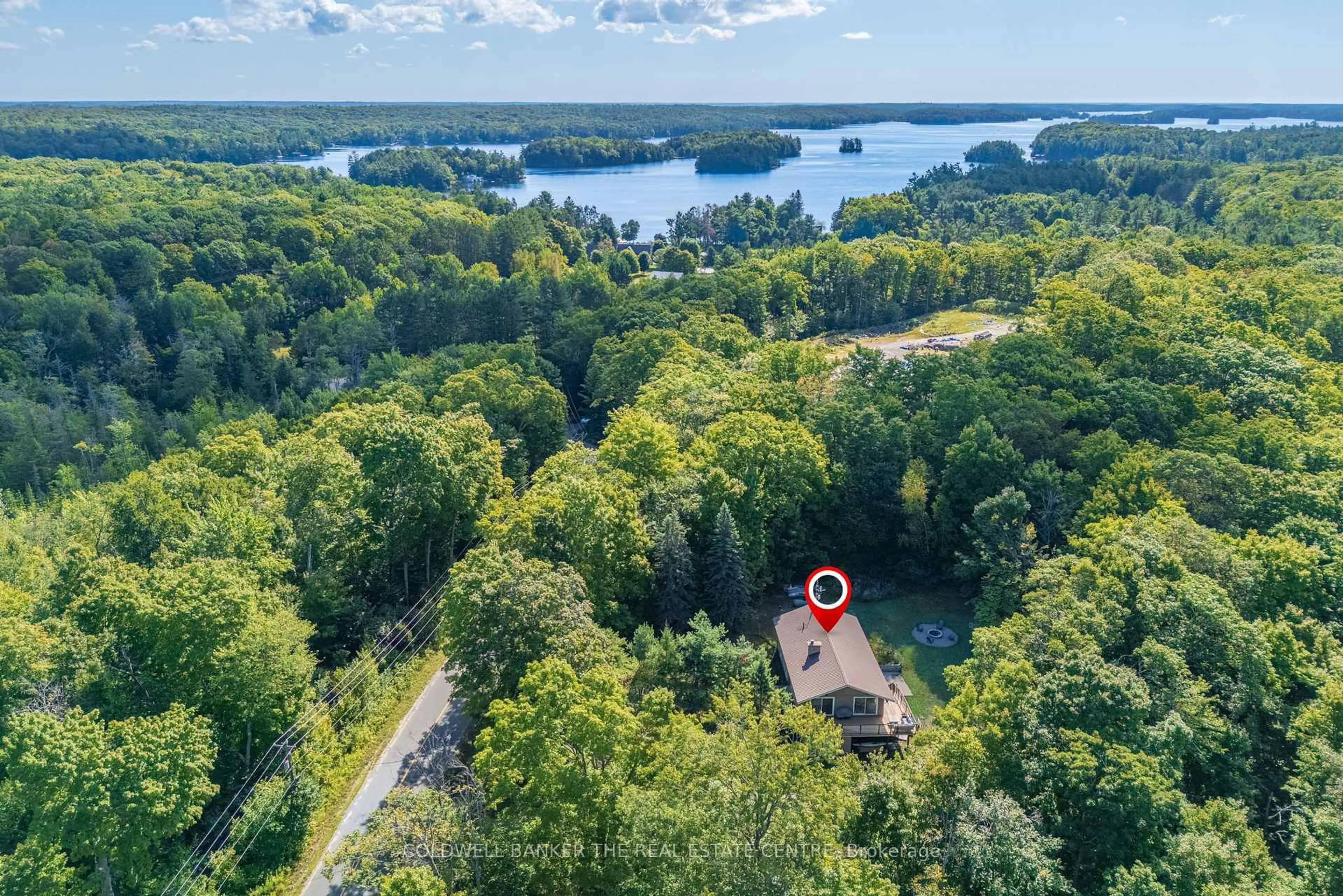 A pic from outside/outdoor area/front of a property/back of a property/a pic from drone, water/lake/river/ocean view for 1100 Mortimers Point Rd, Muskoka Lakes Ontario P0B 1J0