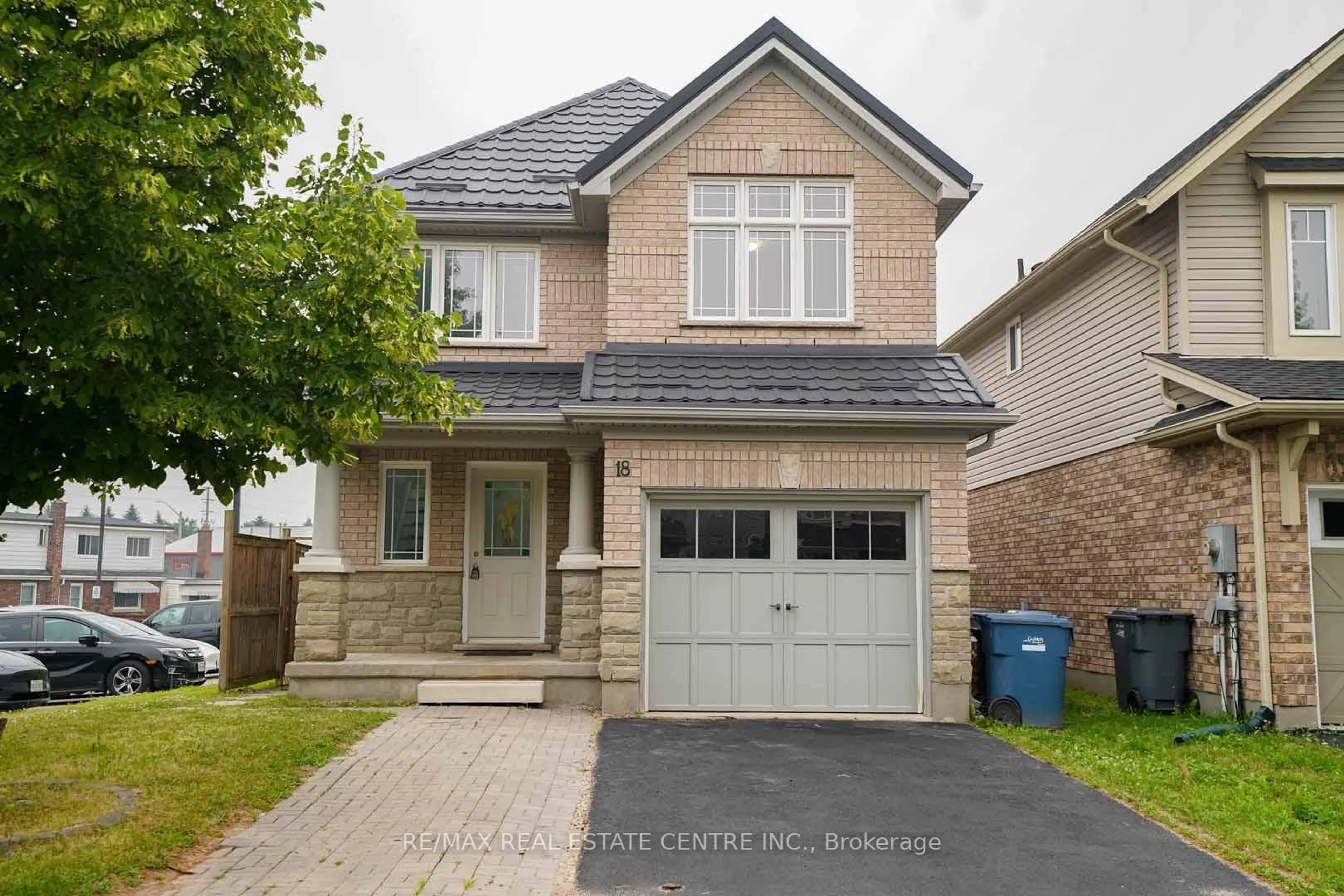 Home with brick exterior material, street for 18 Heritage Dr, Guelph Ontario N1G 0B2