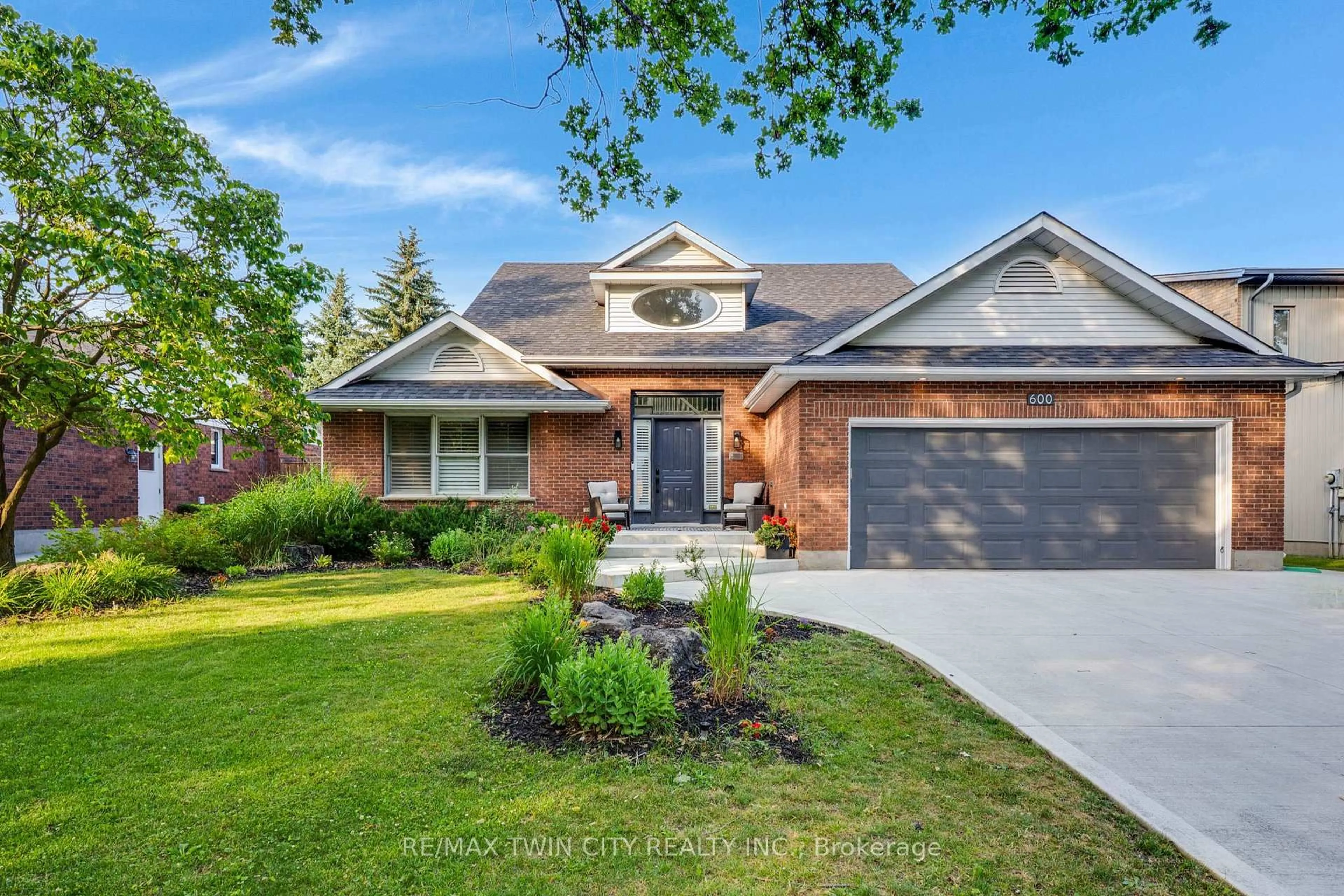 Home with brick exterior material, street for 600 Coppercroft Crt, Waterloo Ontario N2K 3M2